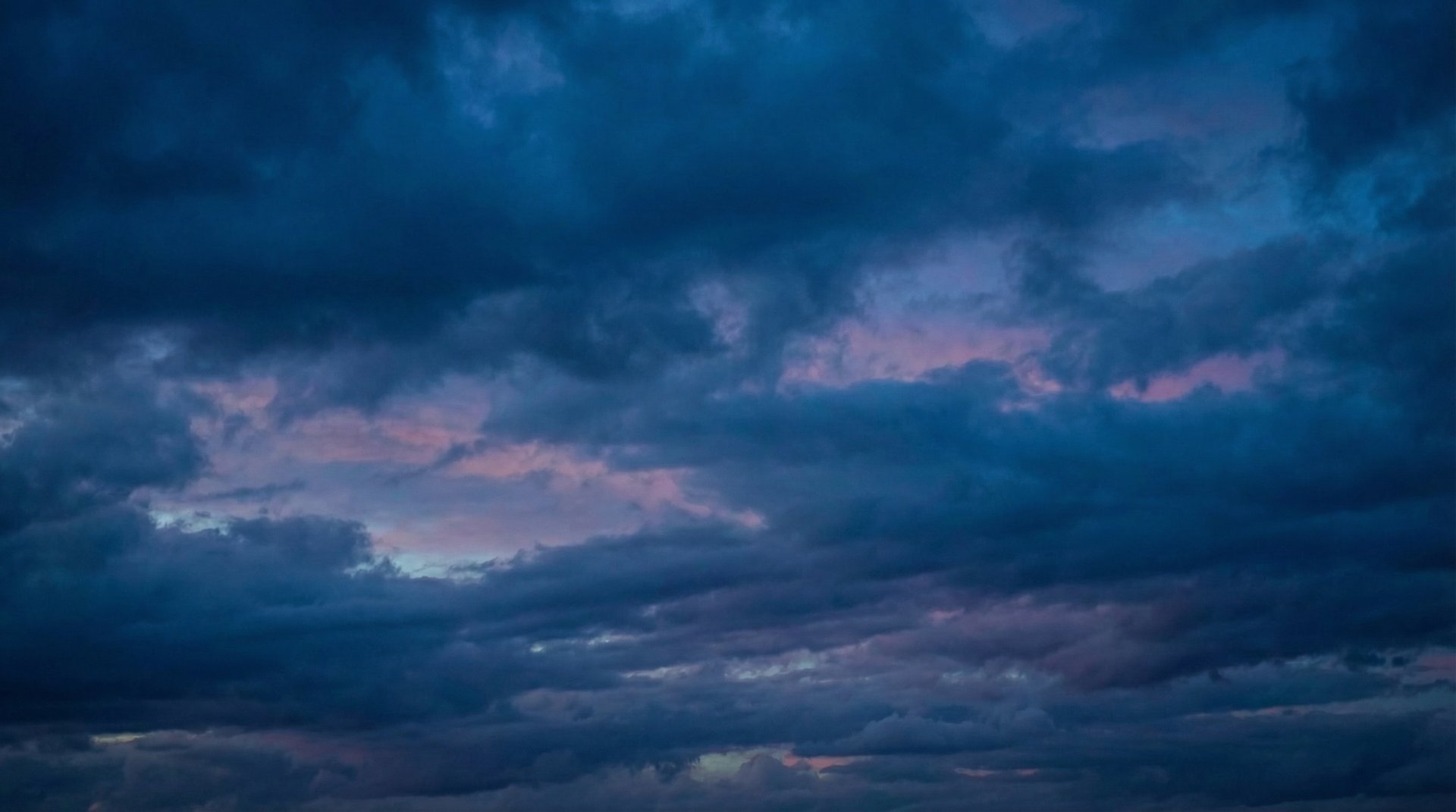 silhouette of city buildings during sunset