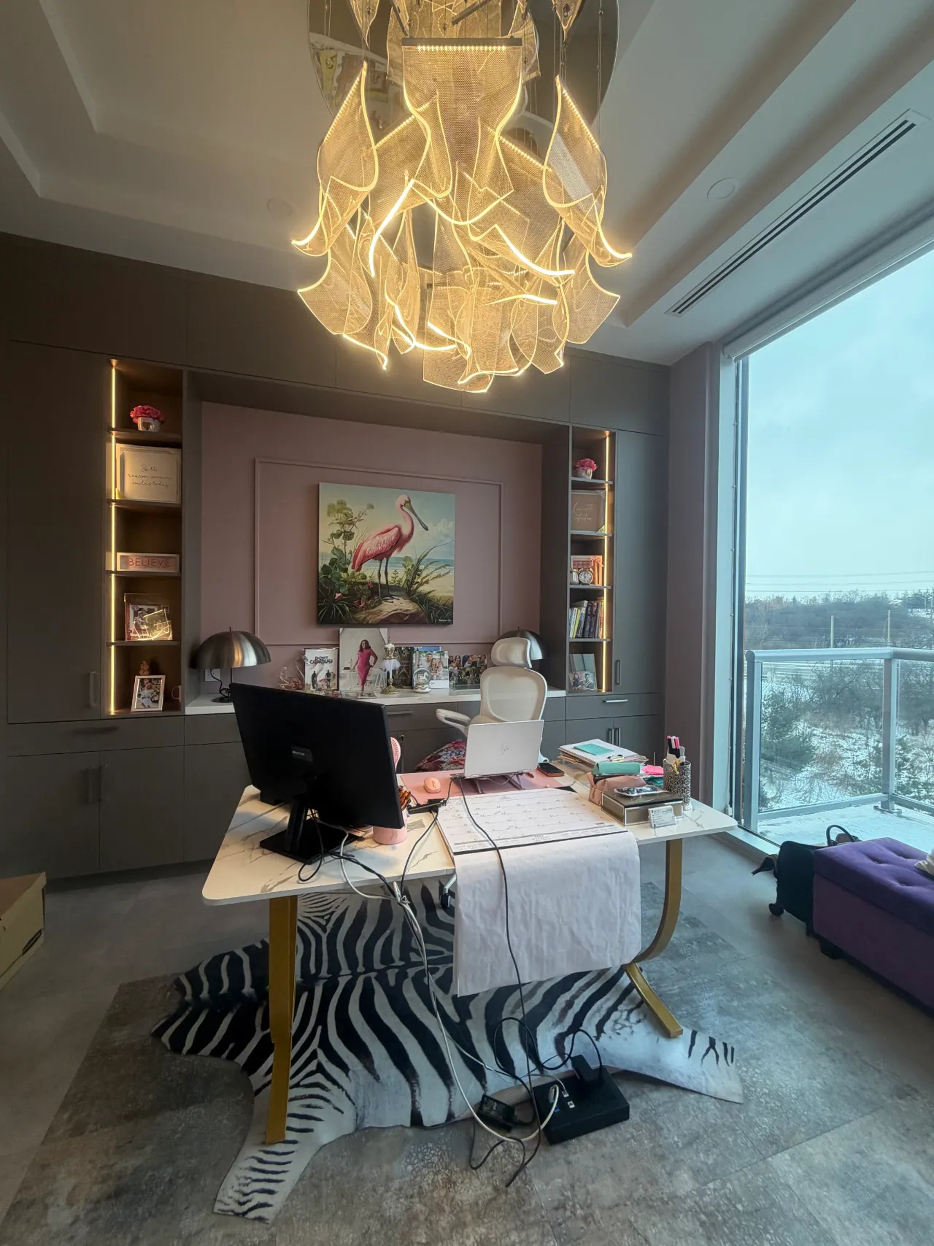 an abstract photo of a curved building with a blue sky in the background