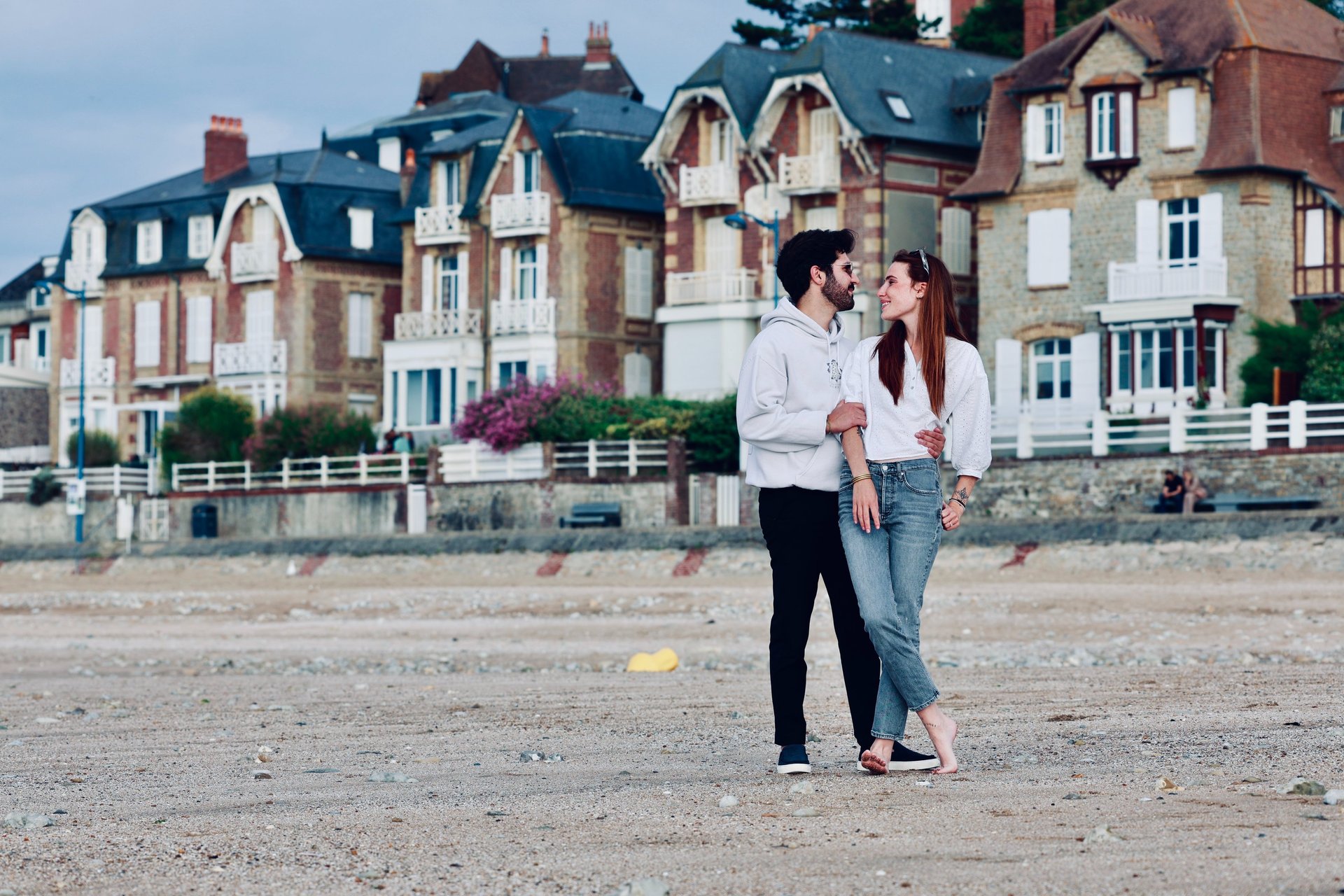couple wearing silver-colored rings
