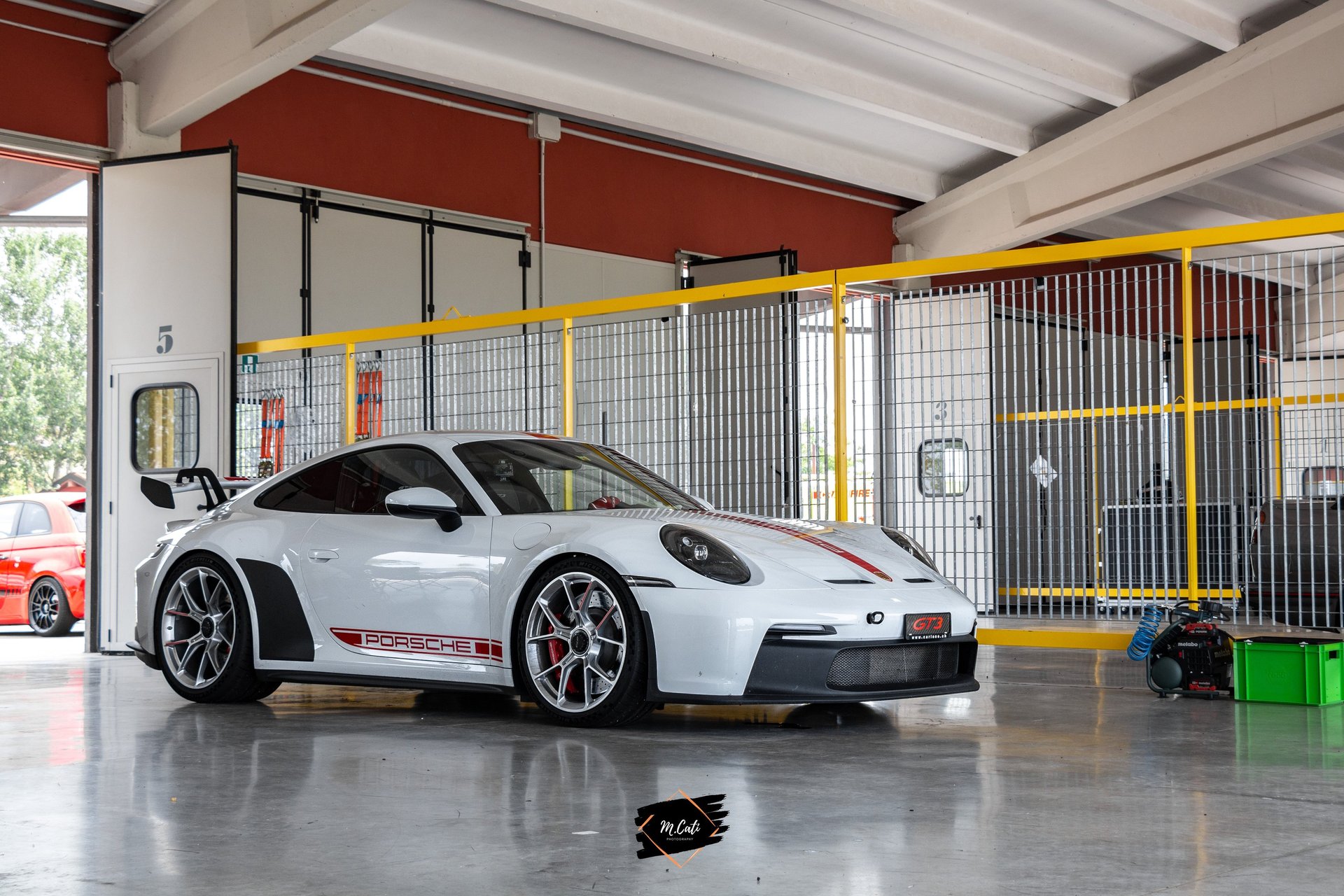 a race track with cars driving on it