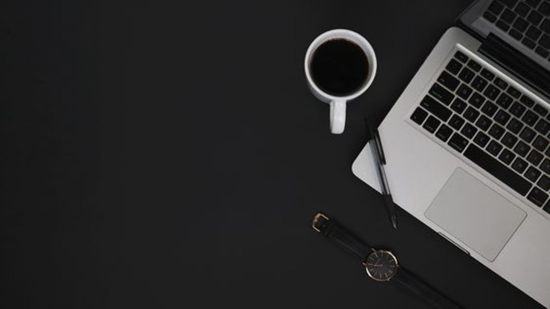 space gray iPhone 6 with Facebook log-in display near Social Media scrabble tiles