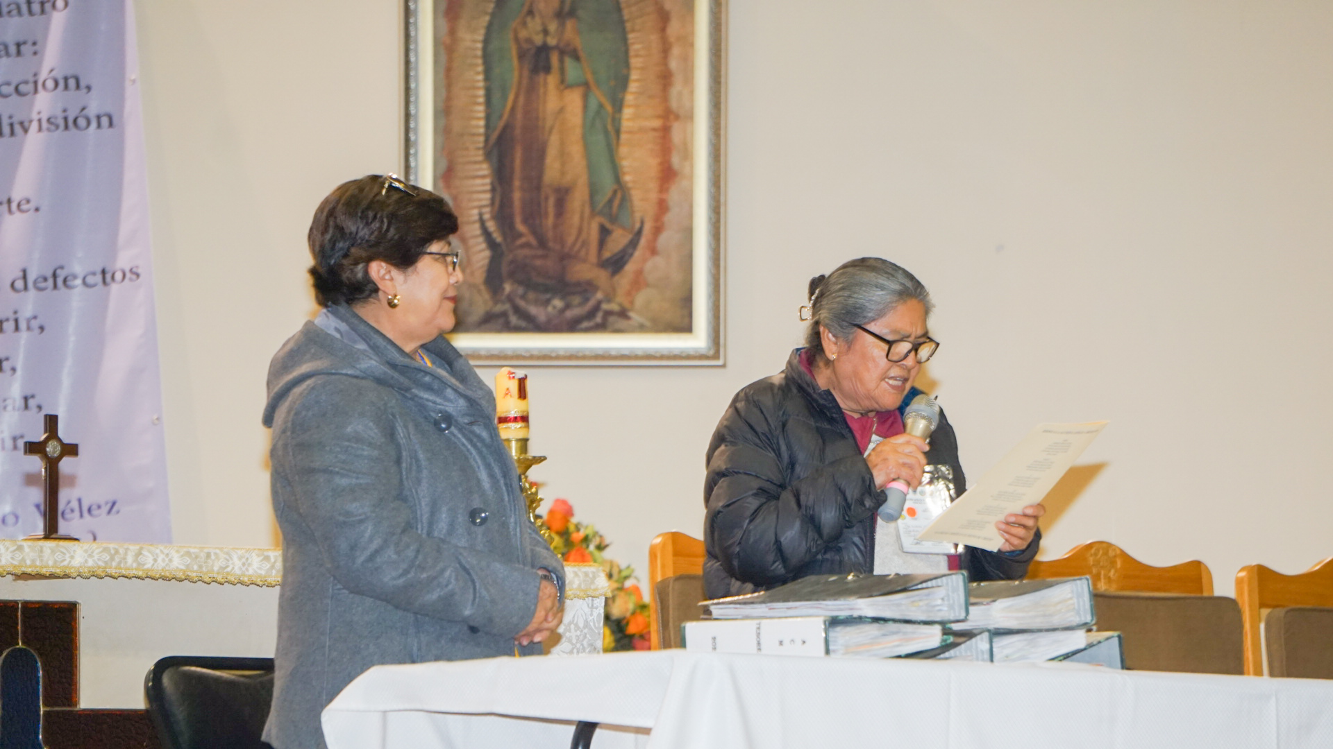 an abstract photo of a curved building with a blue sky in the background