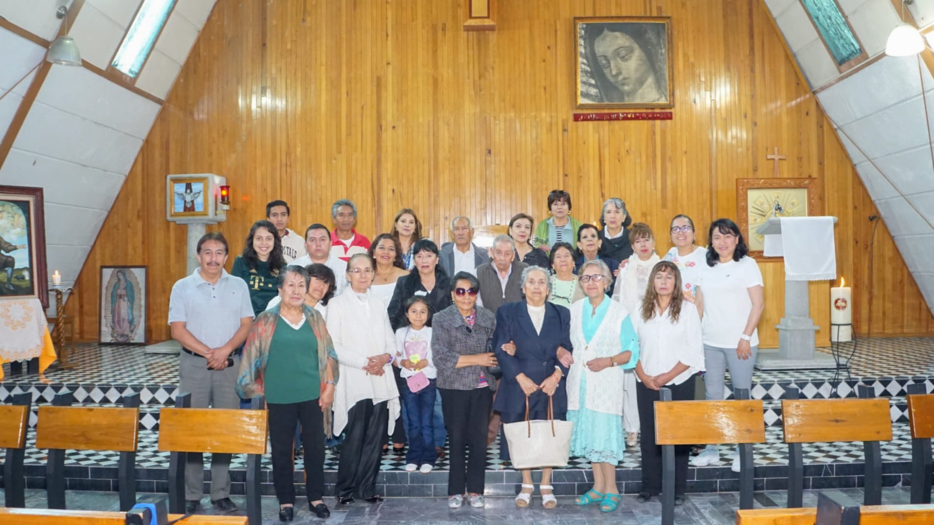 an abstract photo of a curved building with a blue sky in the background
