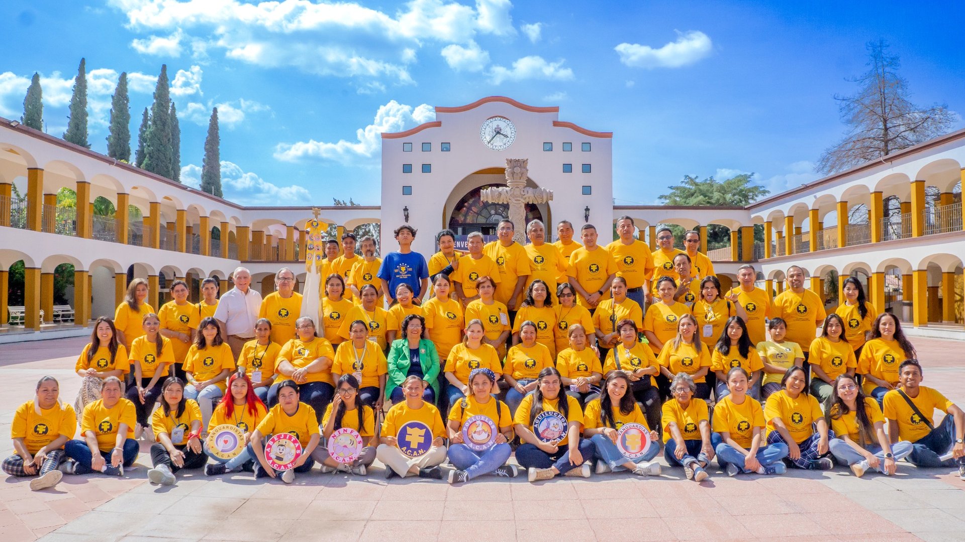 a group of young children sitting next to each other
