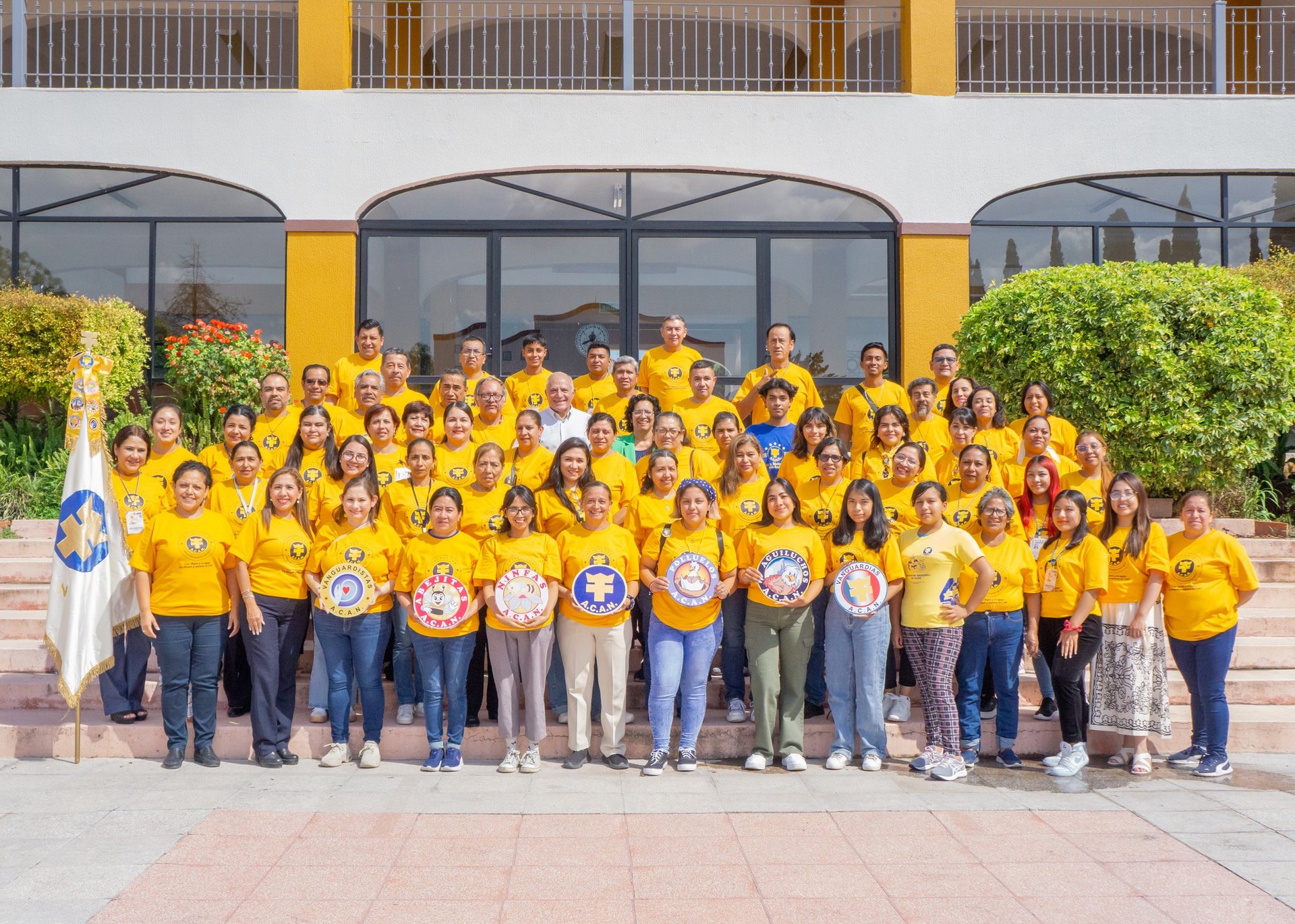 an abstract photo of a curved building with a blue sky in the background