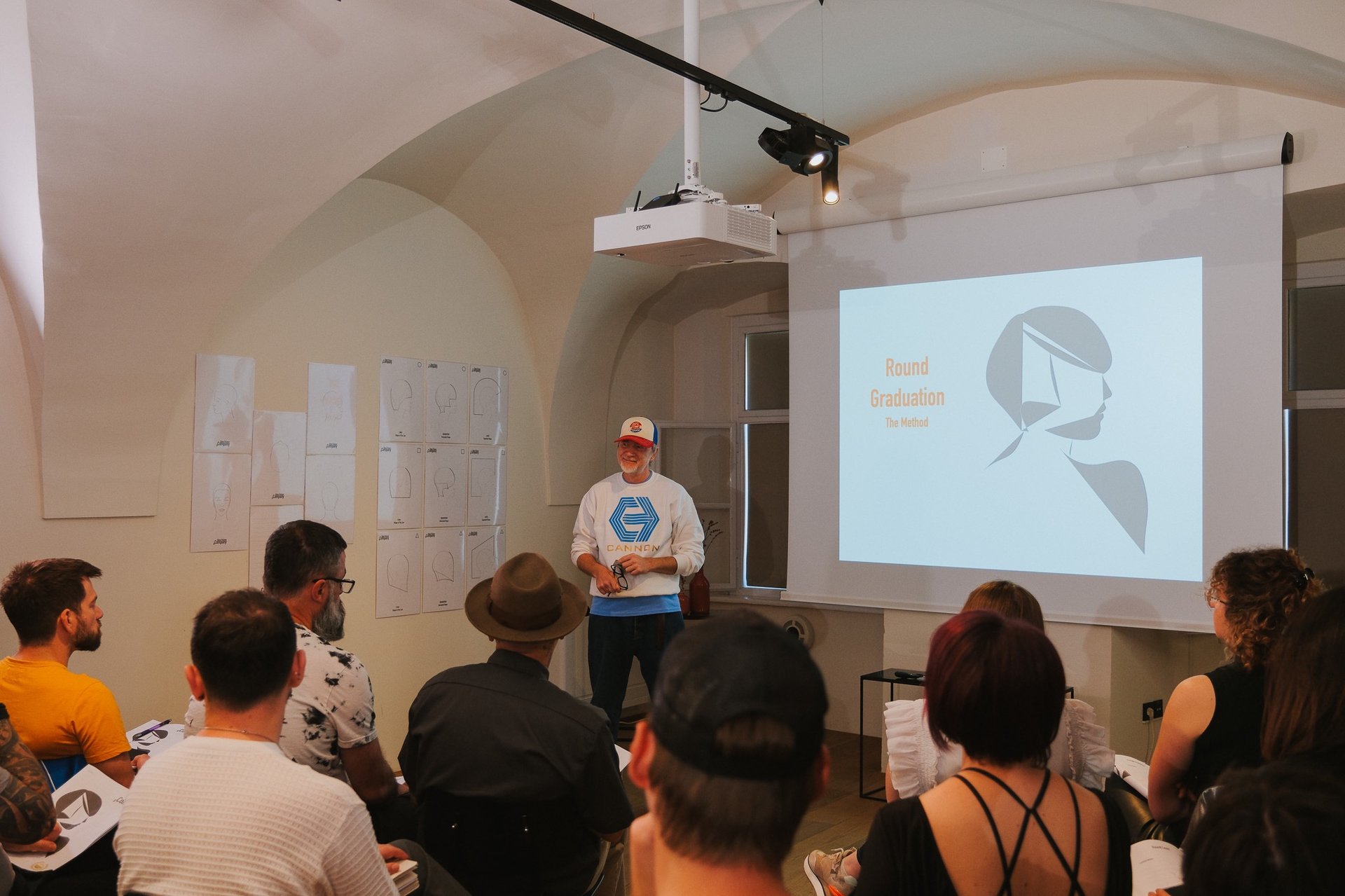 an abstract photo of a curved building with a blue sky in the background