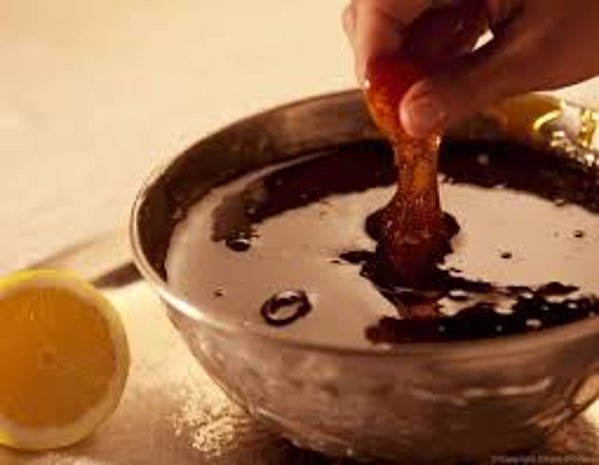 woman wearing yellow long-sleeved dress under white clouds and blue sky during daytime