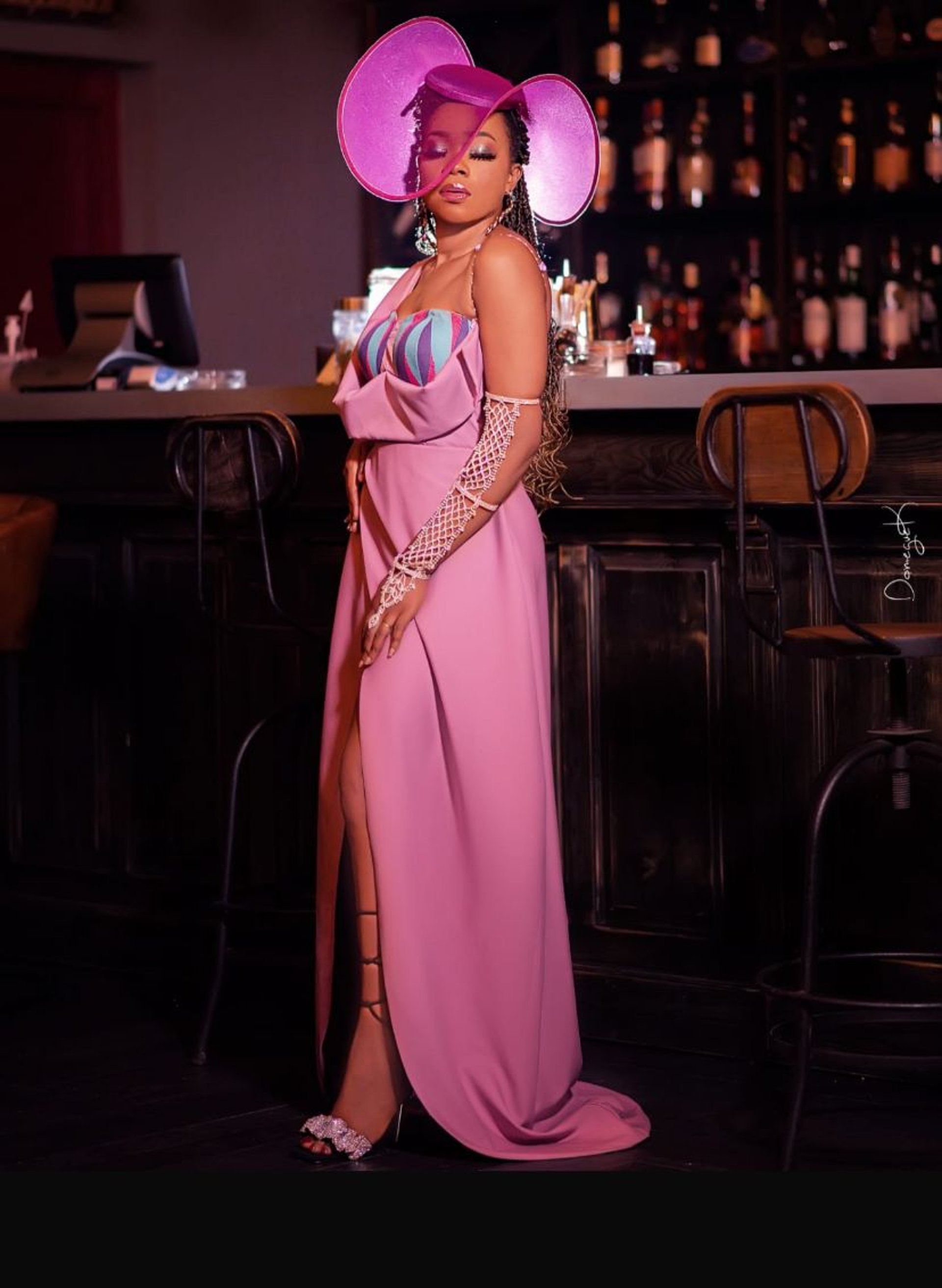 an abstract photo of a curved building with a blue sky in the background