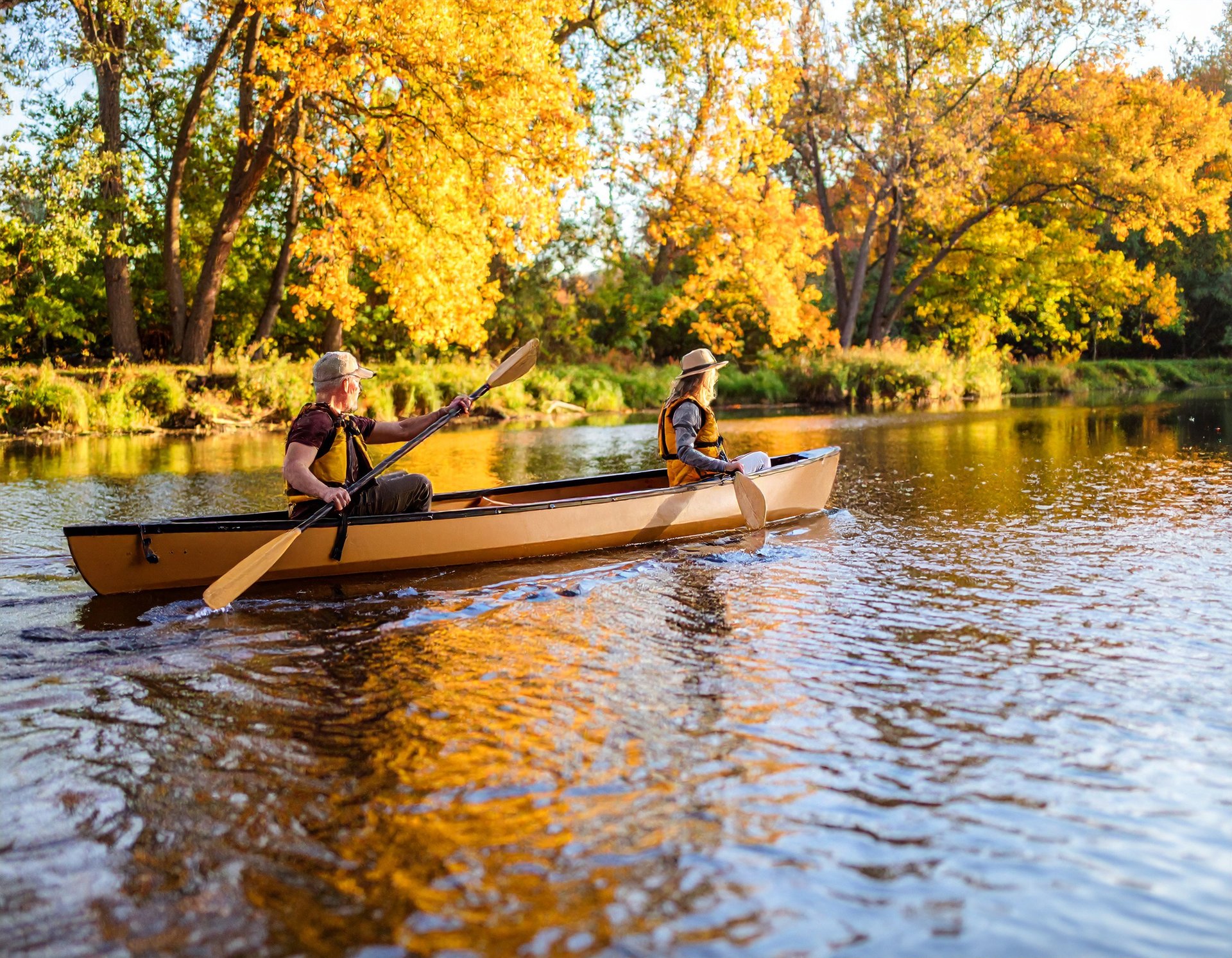 black and brown leather padded tub sofa
