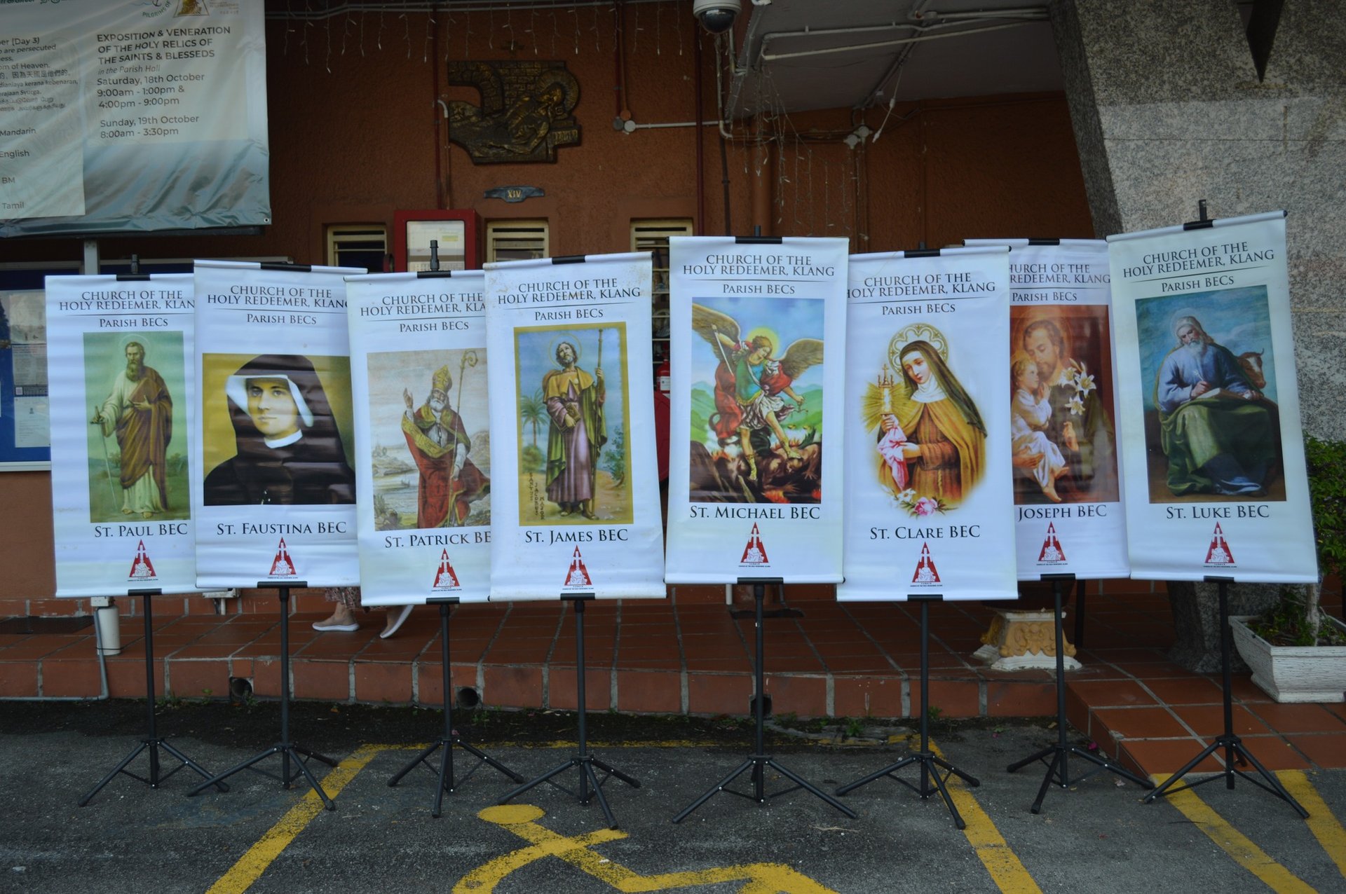 silhouette of child sitting behind tree during sunset