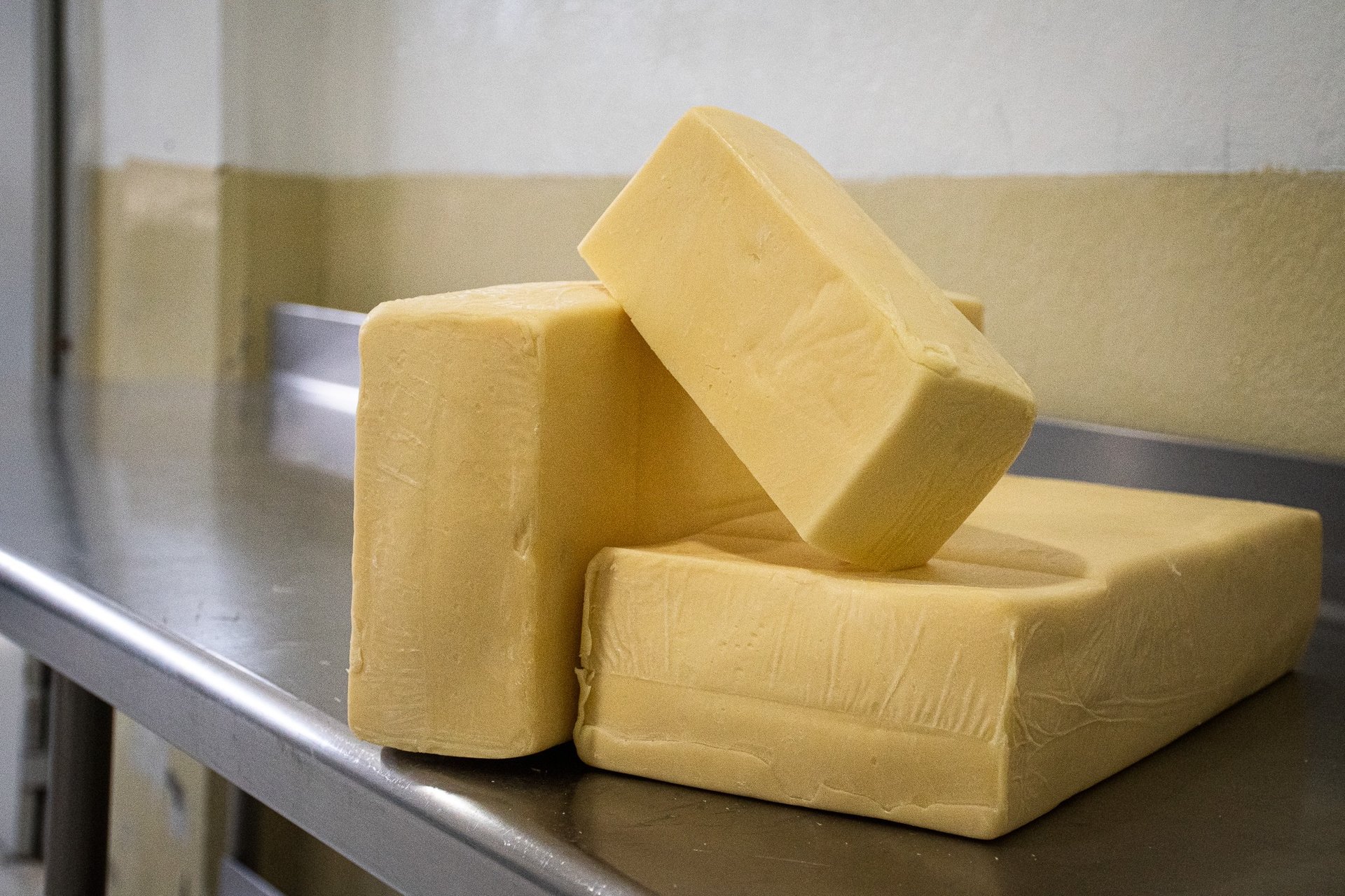 woman wearing yellow long-sleeved dress under white clouds and blue sky during daytime