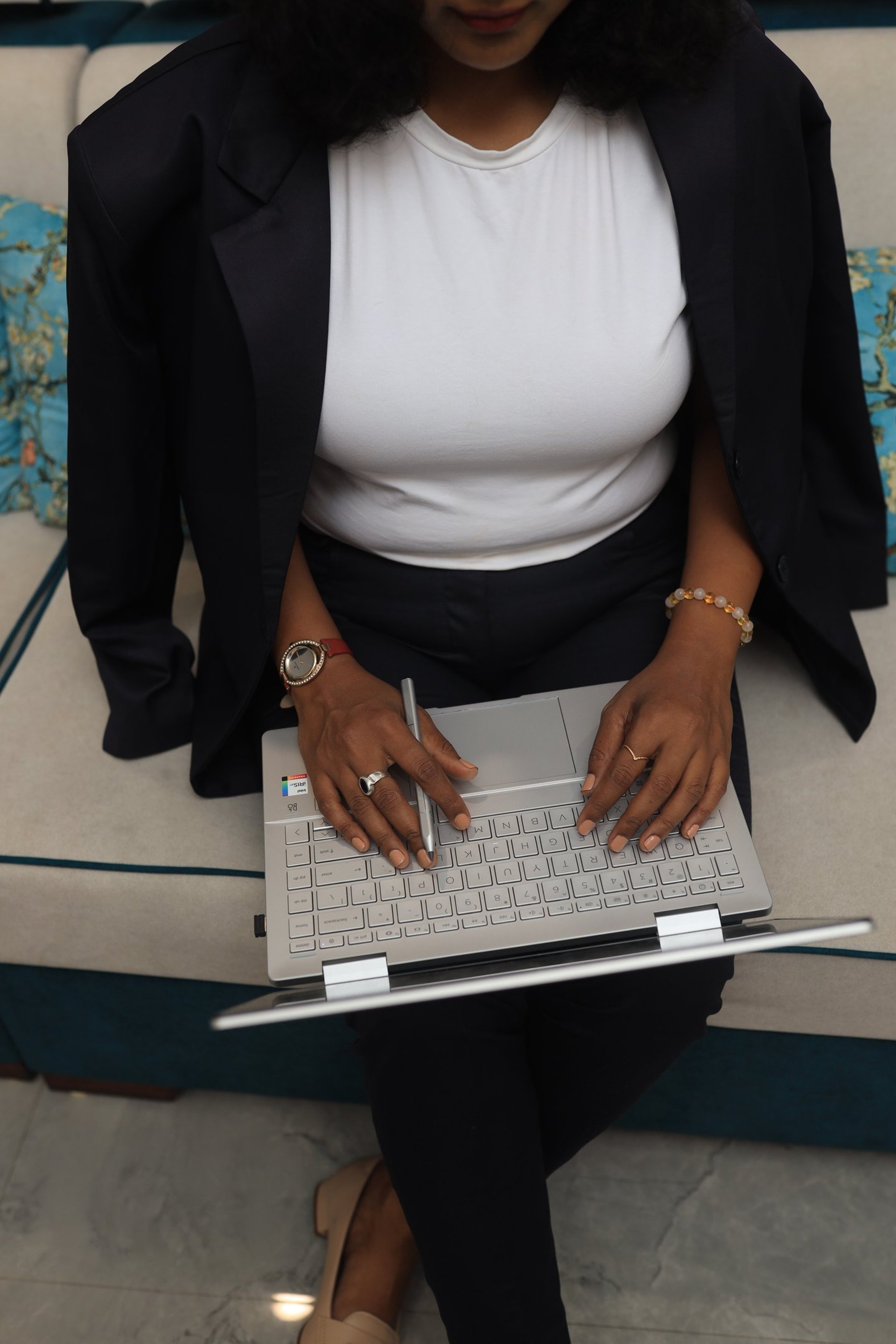 a white desk with a laptop on top of it
