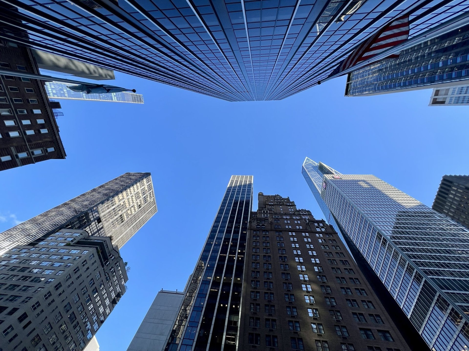 low angle photo of city high rise buildings during daytime