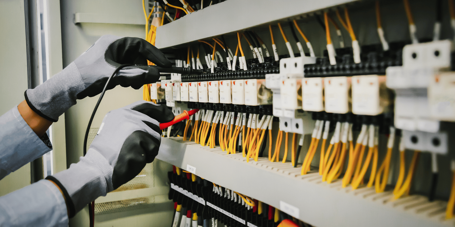 an abstract photo of a curved building with a blue sky in the background