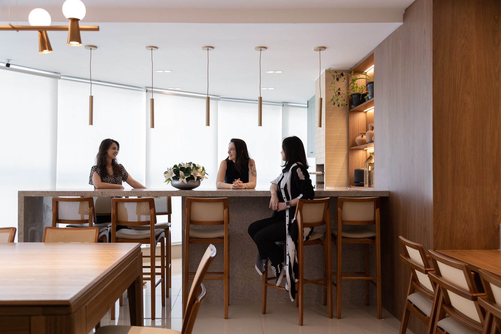 an abstract photo of a curved building with a blue sky in the background