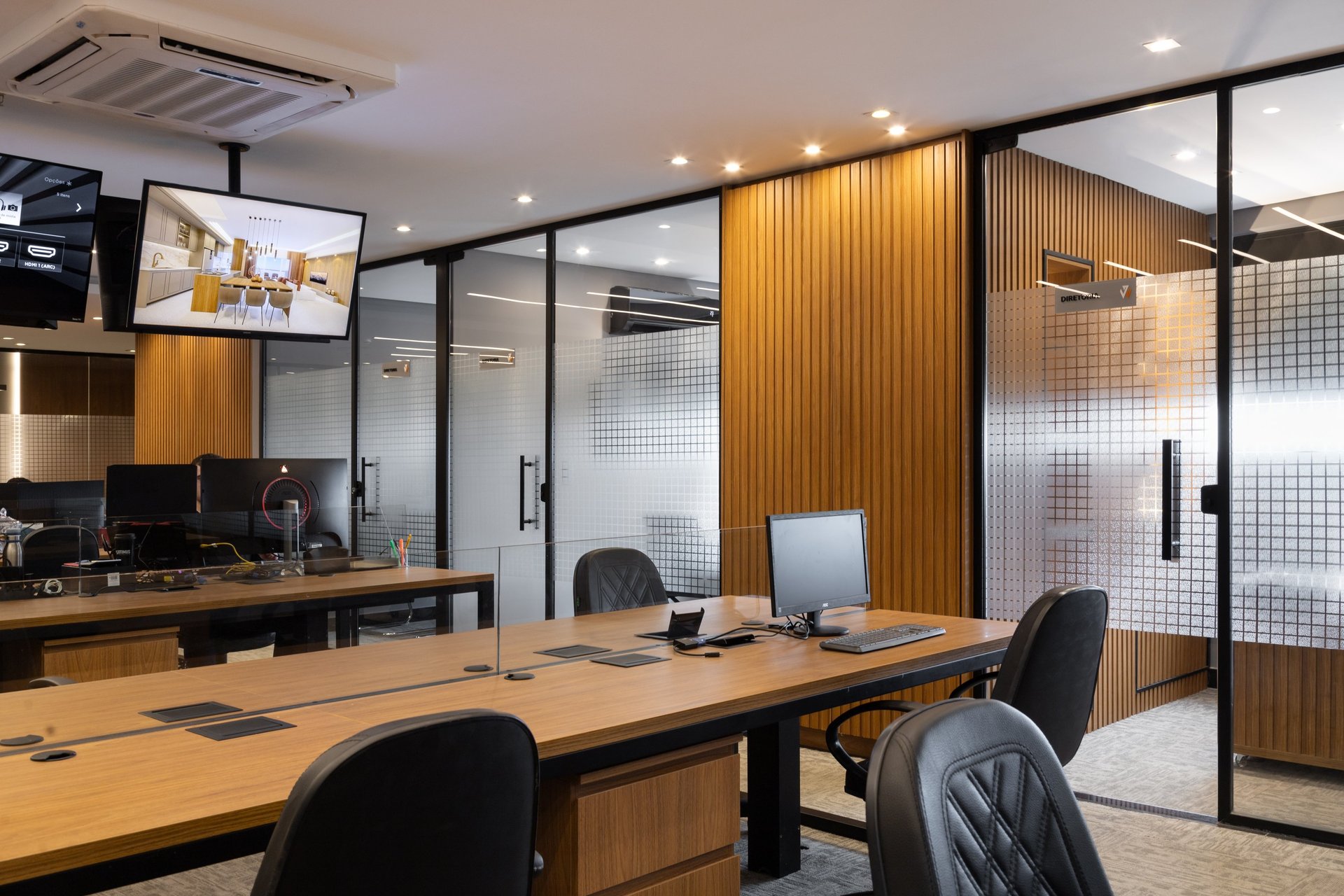 an abstract photo of a curved building with a blue sky in the background