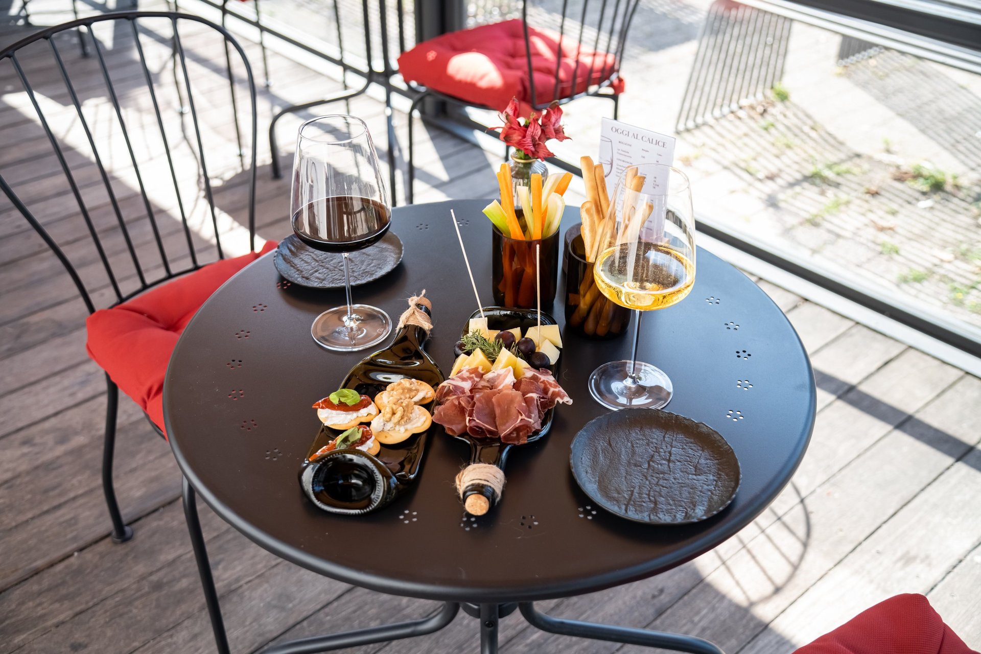 an abstract photo of a curved building with a blue sky in the background