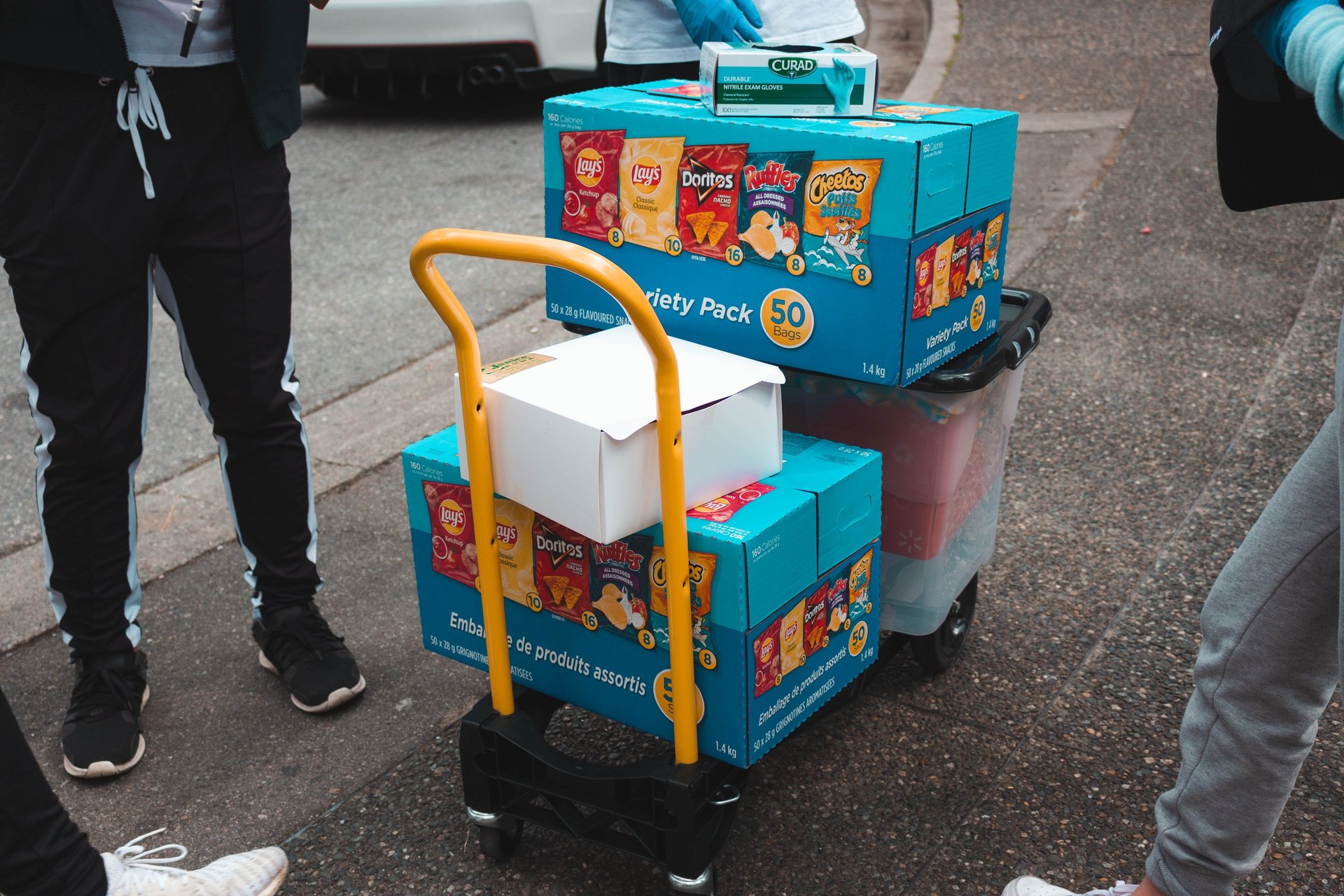 an abstract photo of a curved building with a blue sky in the background