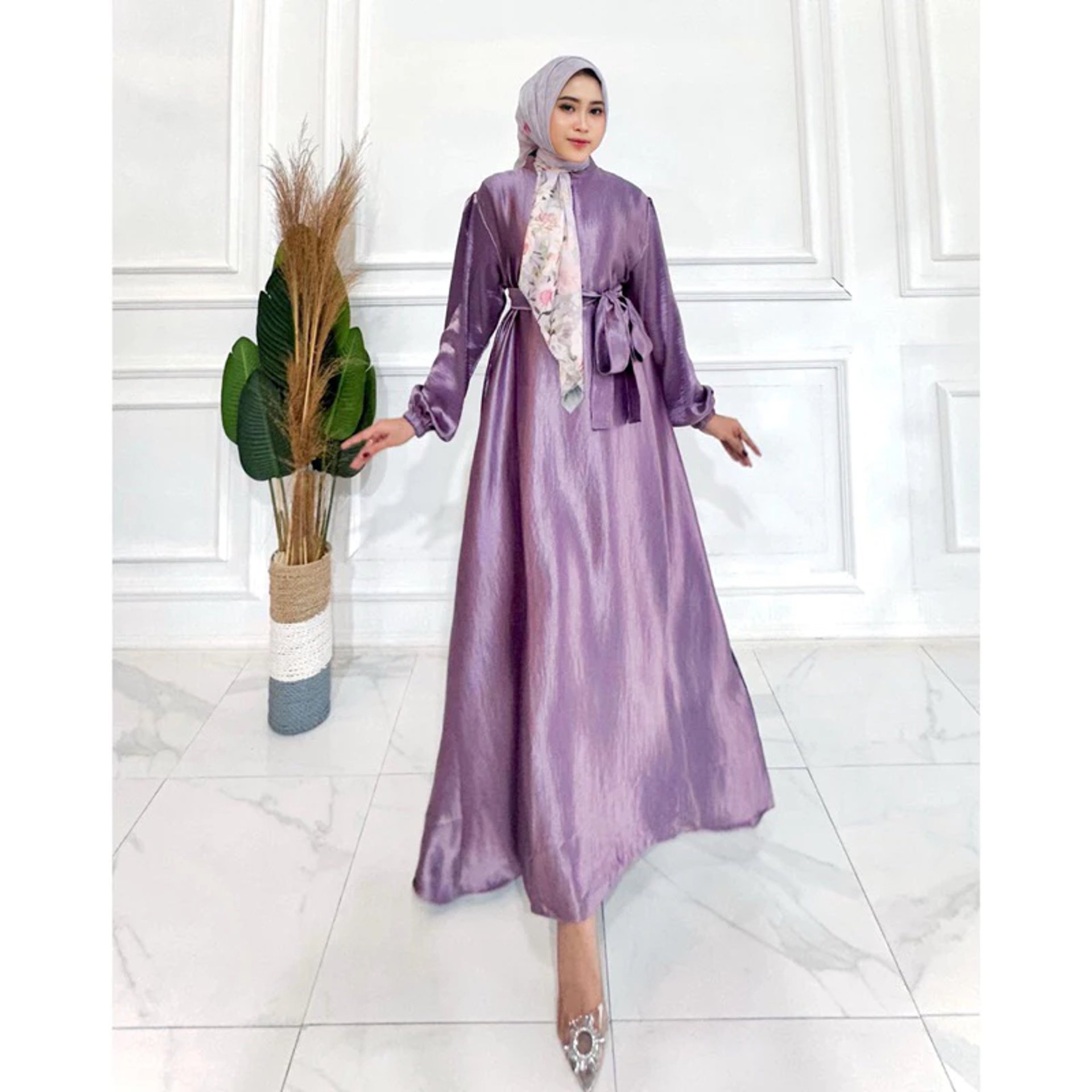 woman holding dried flower