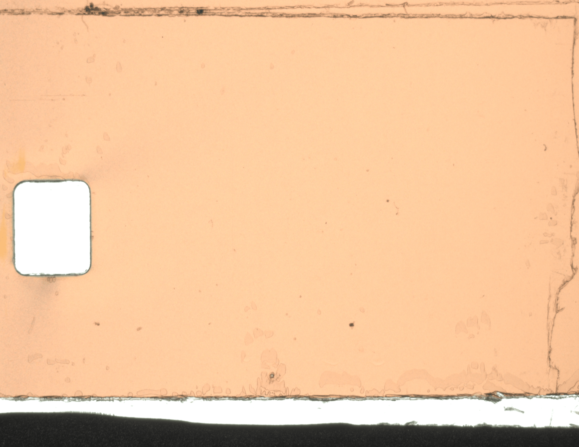 an abstract photo of a curved building with a blue sky in the background