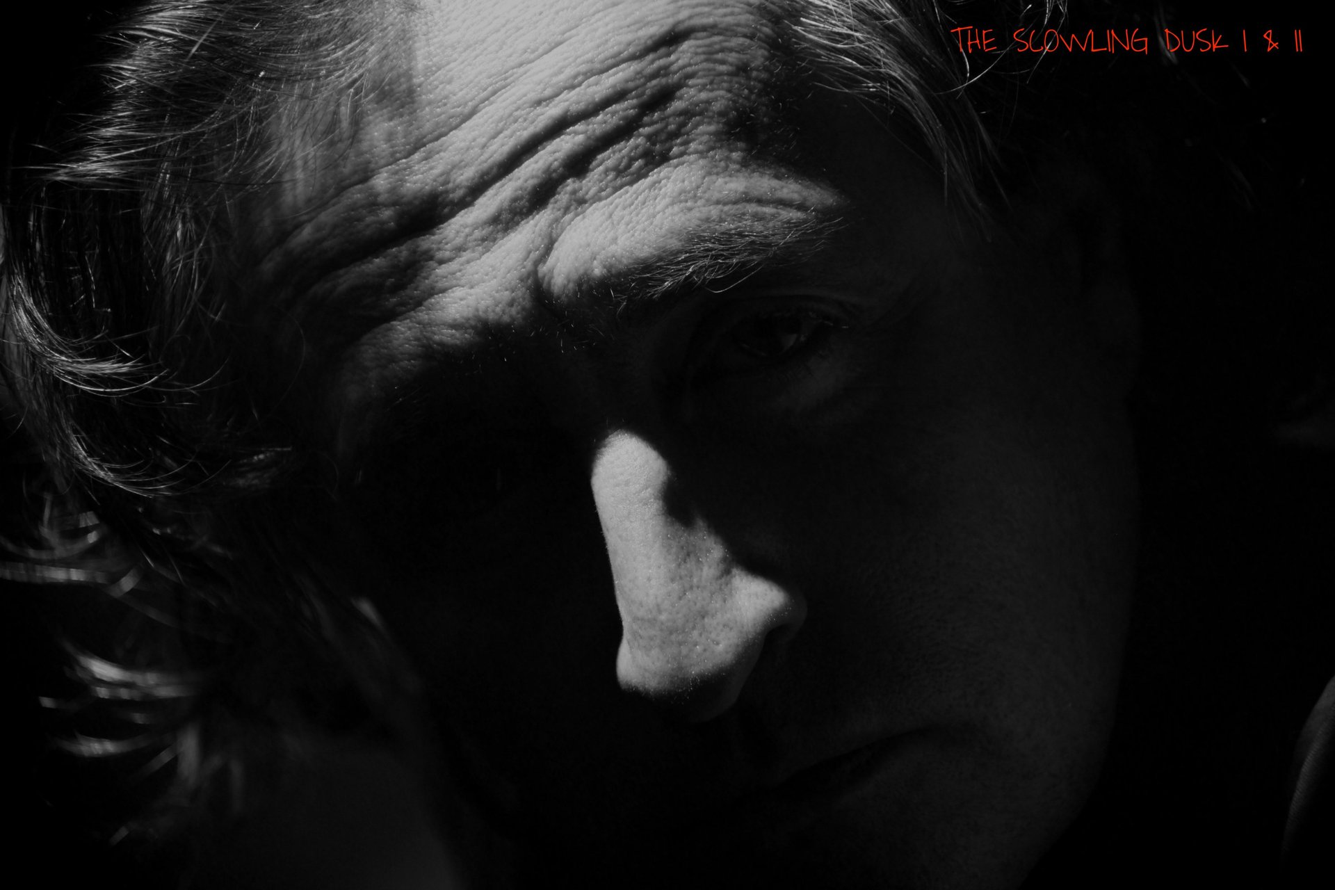 an abstract photo of a curved building with a blue sky in the background