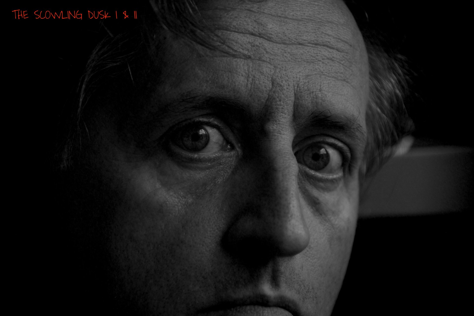 an abstract photo of a curved building with a blue sky in the background