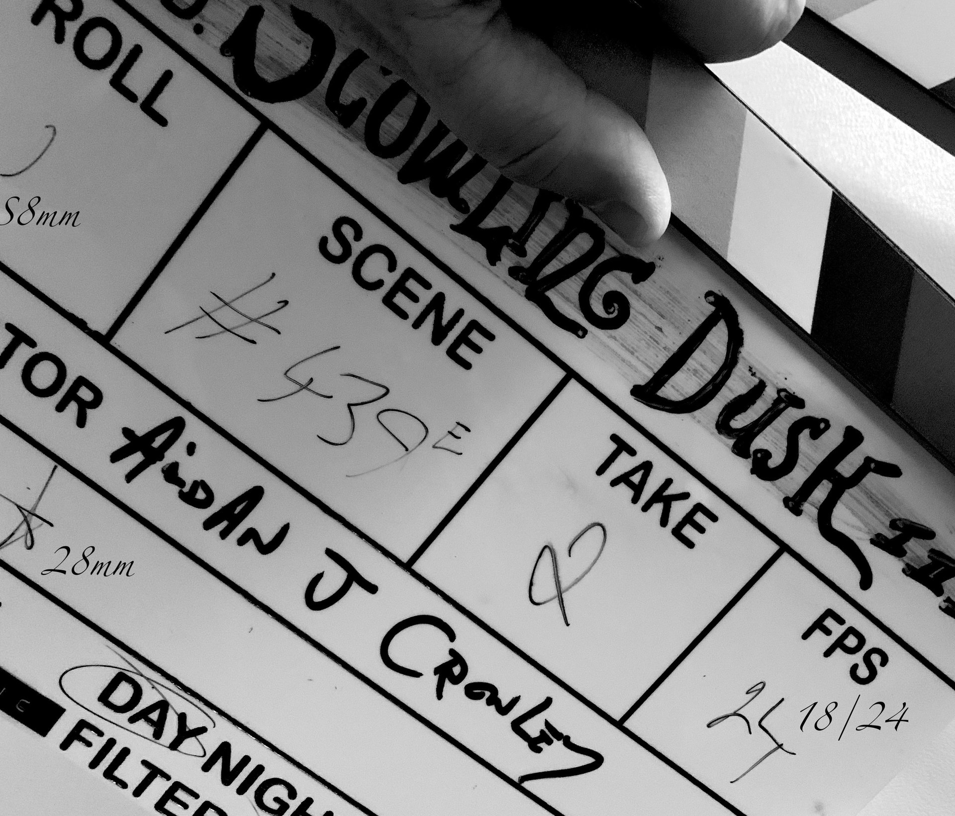 an abstract photo of a curved building with a blue sky in the background