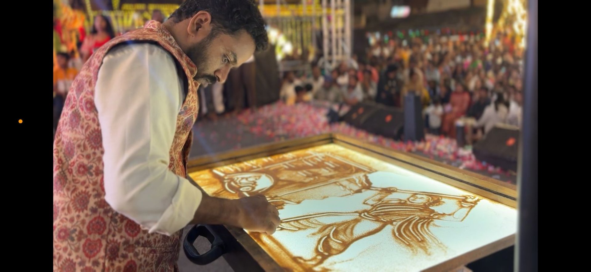 a sand sculpture of a woman in a kimono
