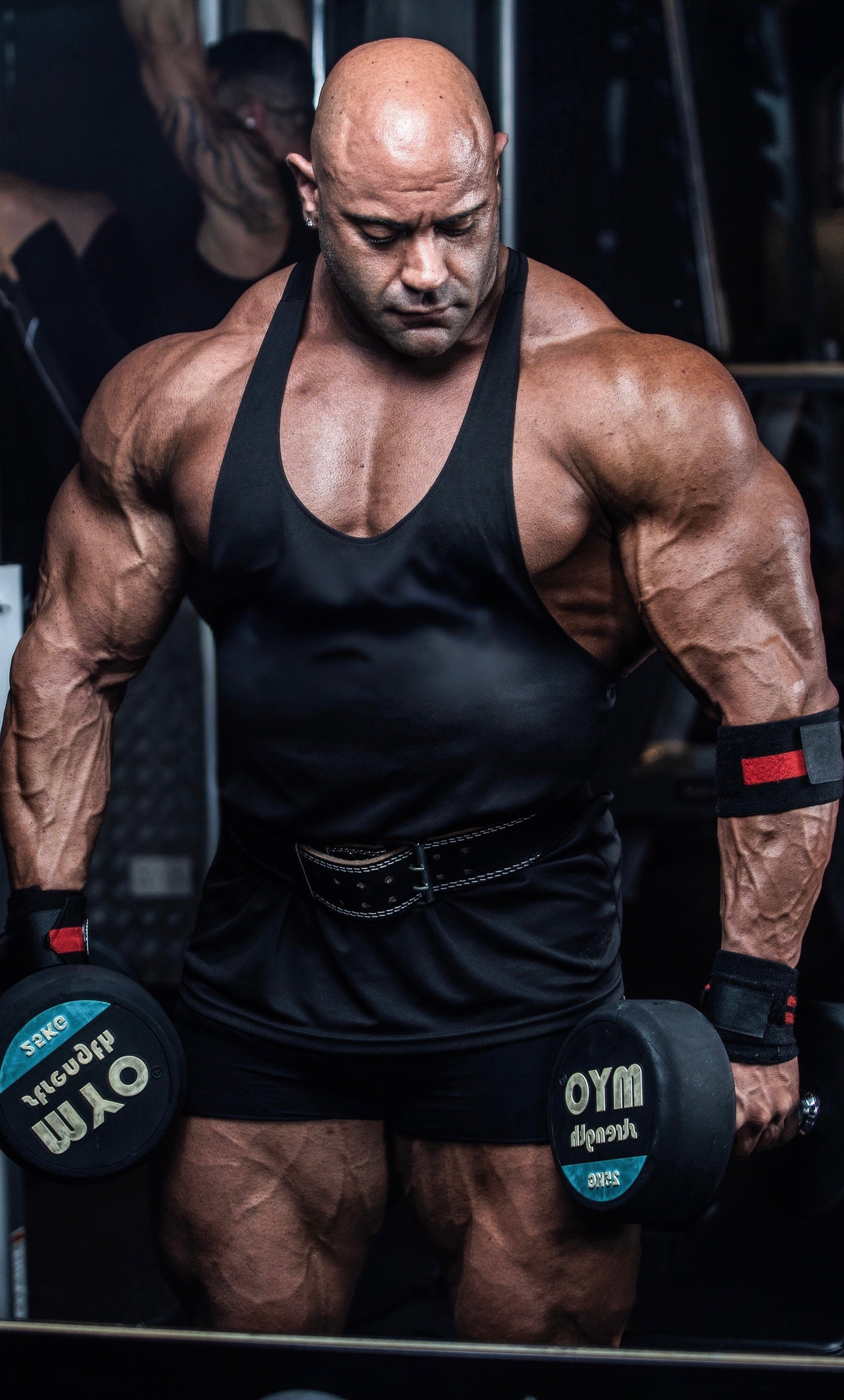 black and brown leather padded tub sofa