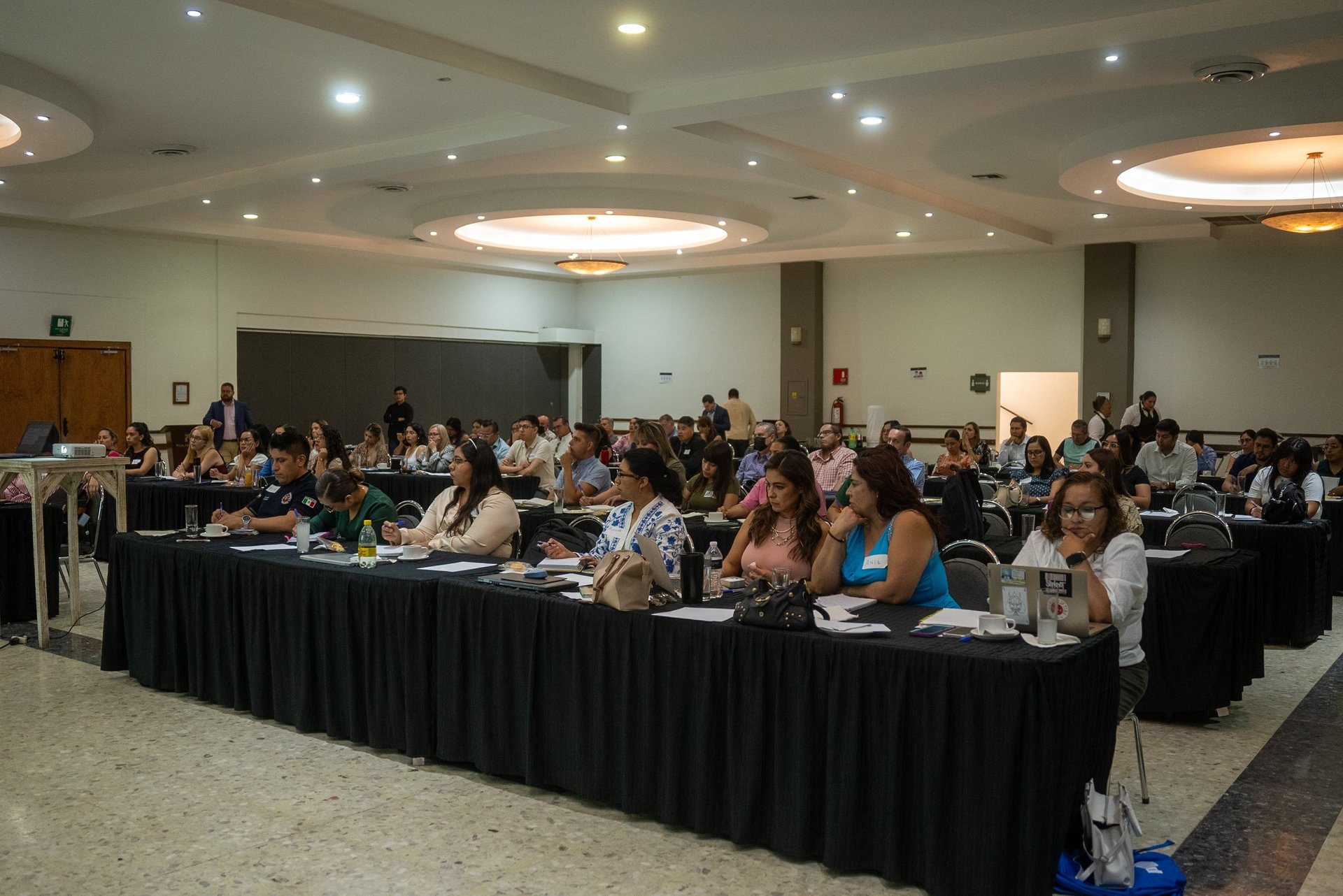 woman wearing yellow long-sleeved dress under white clouds and blue sky during daytime