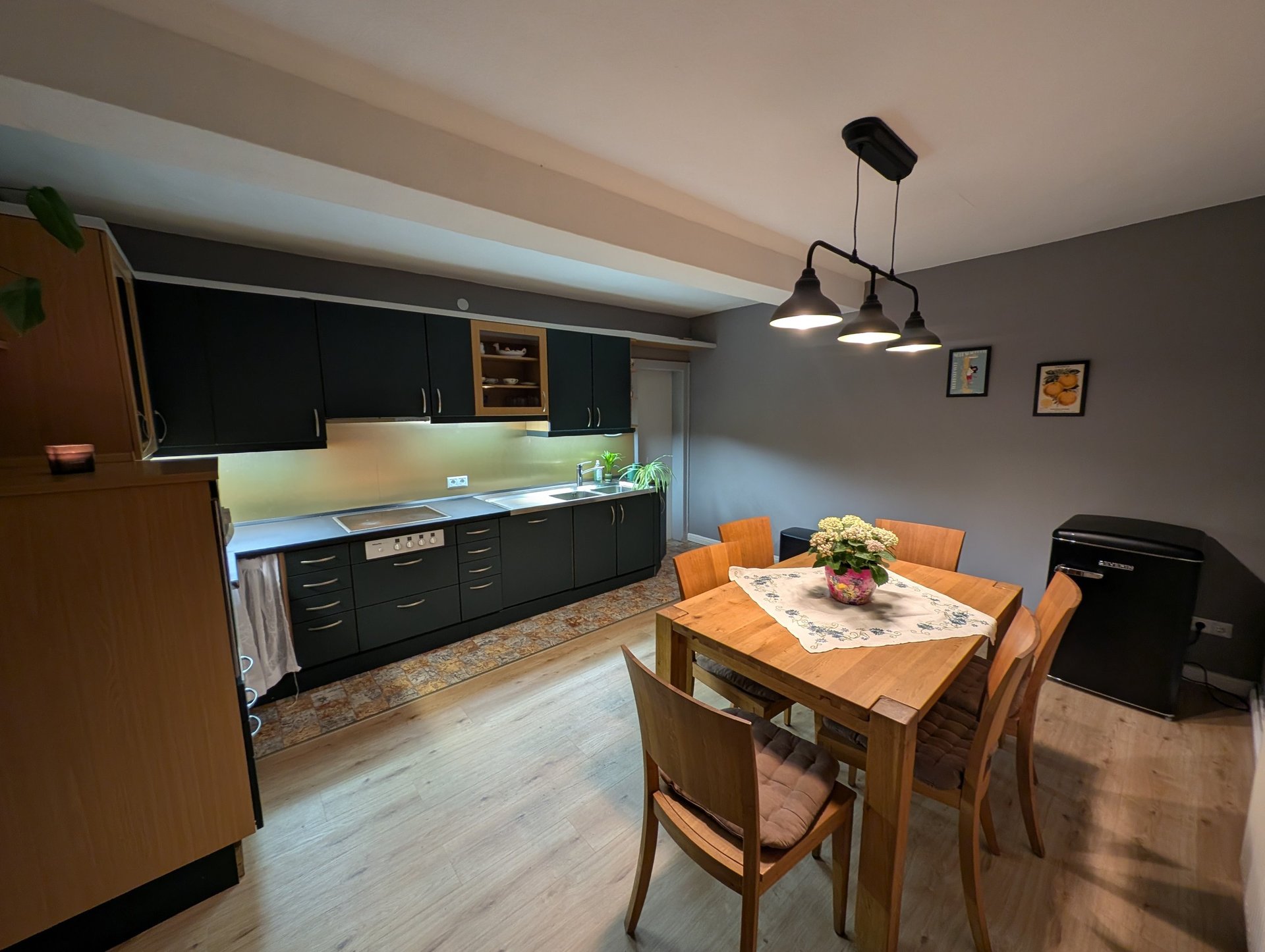 woman wearing yellow long-sleeved dress under white clouds and blue sky during daytime