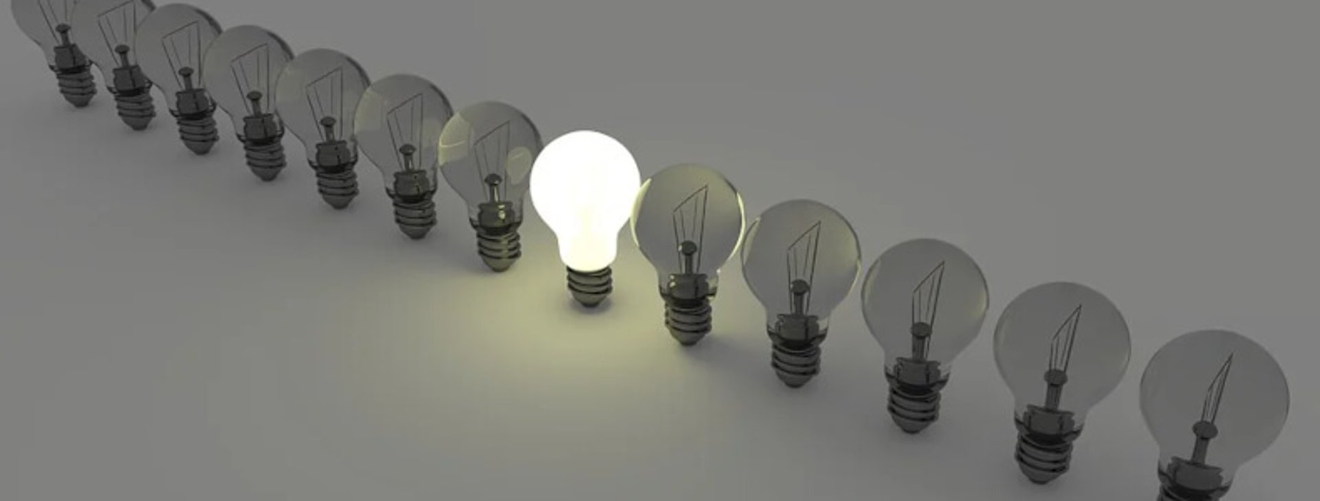 clear glass light bulb with white background