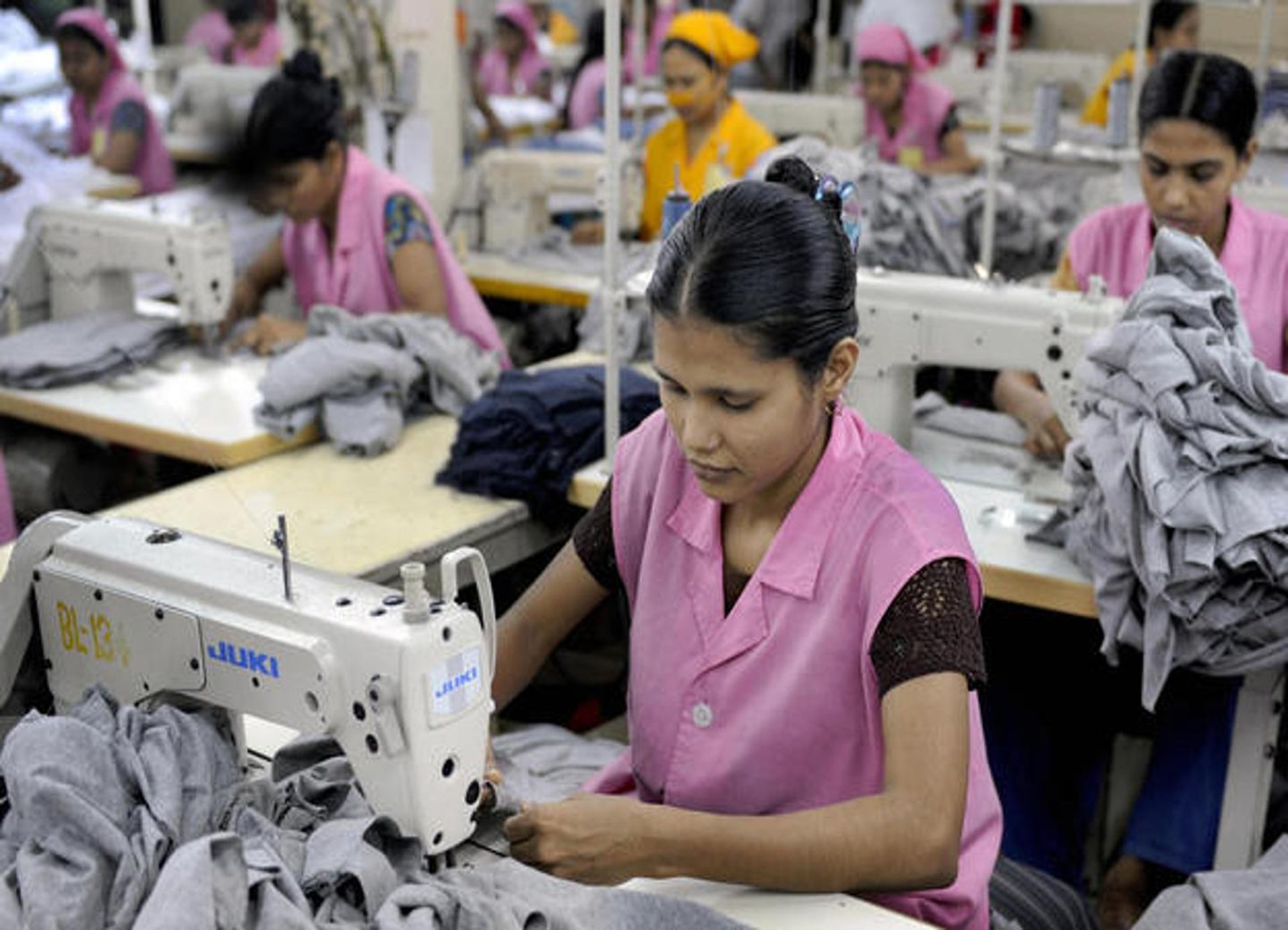 a group of people working in a factory