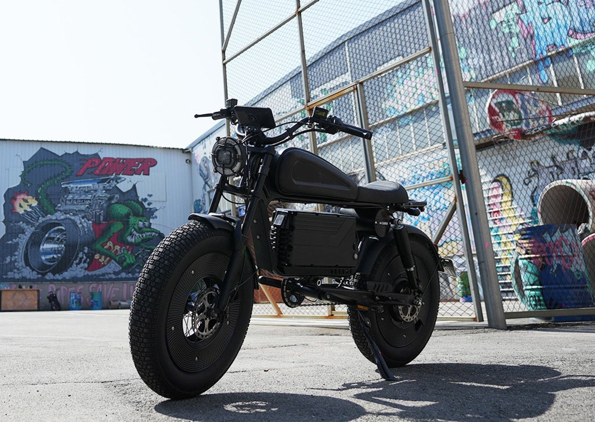 black and brown leather padded tub sofa