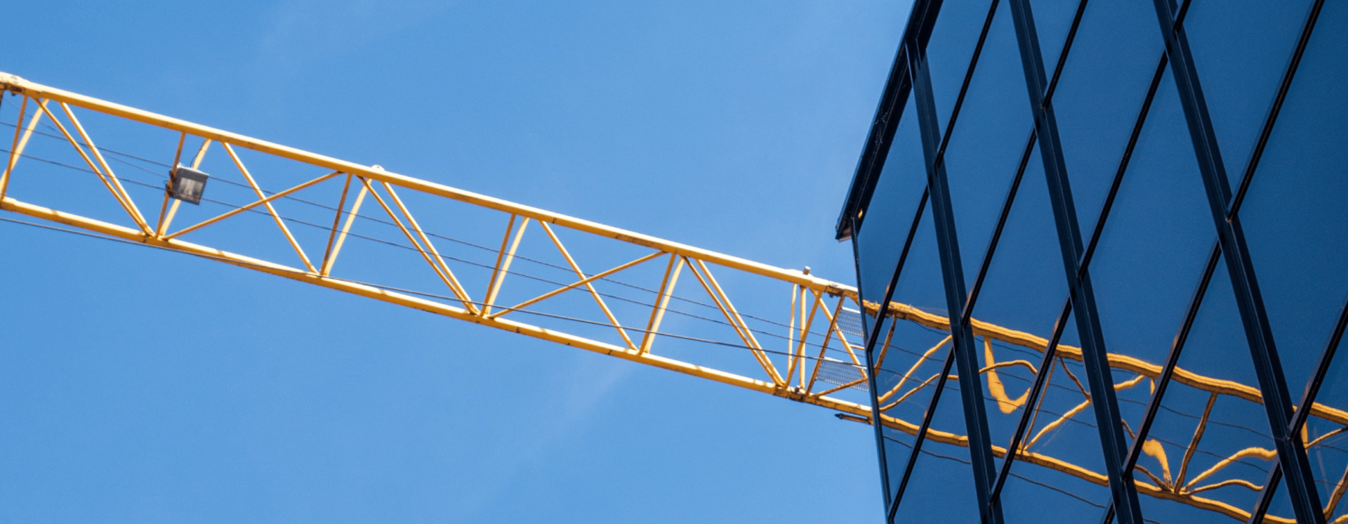 glass building under clear blue sky