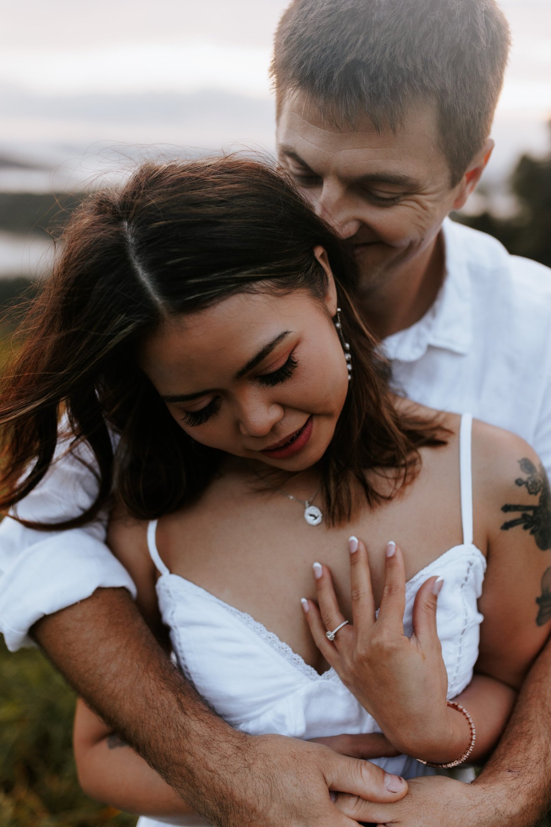 couple wearing silver-colored rings