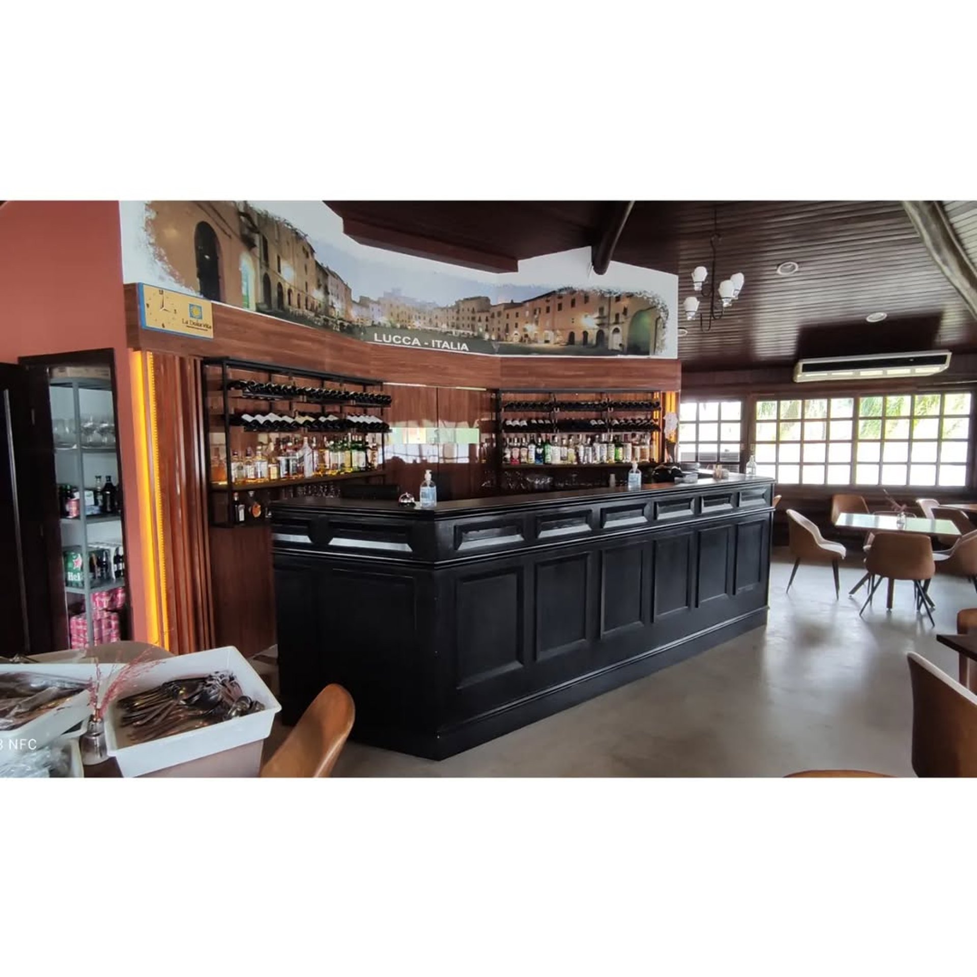 woman wearing yellow long-sleeved dress under white clouds and blue sky during daytime