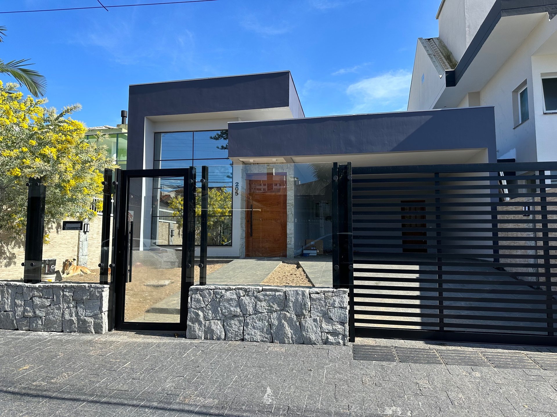 black and brown leather padded tub sofa