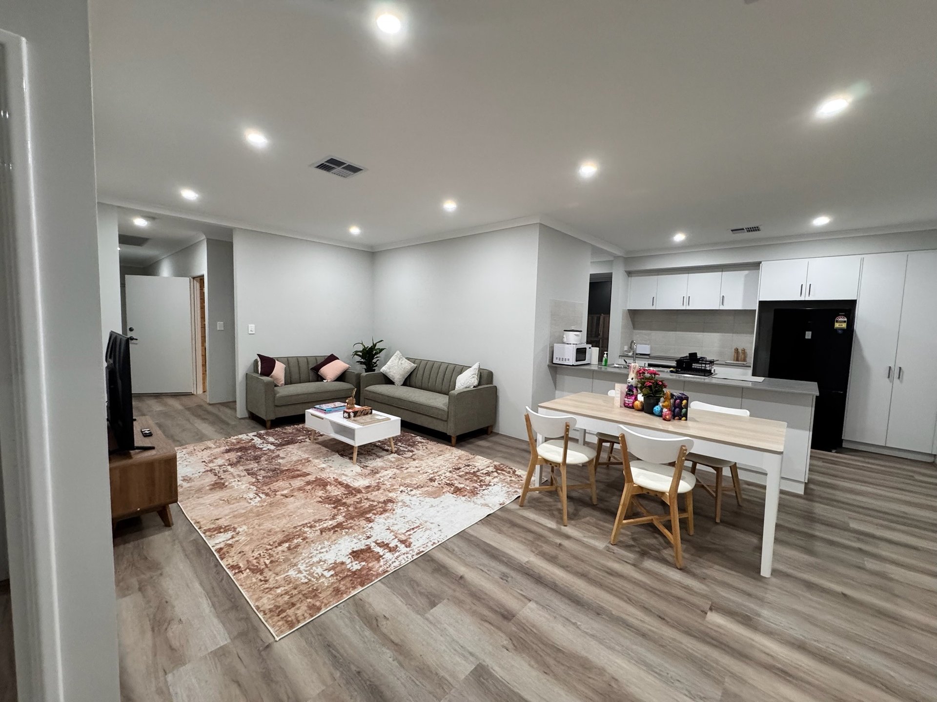 black and brown leather padded tub sofa