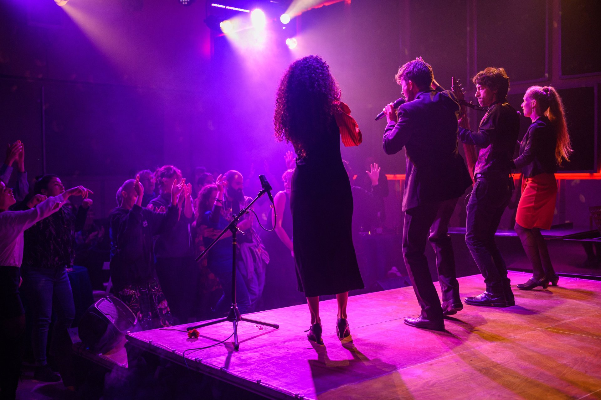 woman wearing yellow long-sleeved dress under white clouds and blue sky during daytime