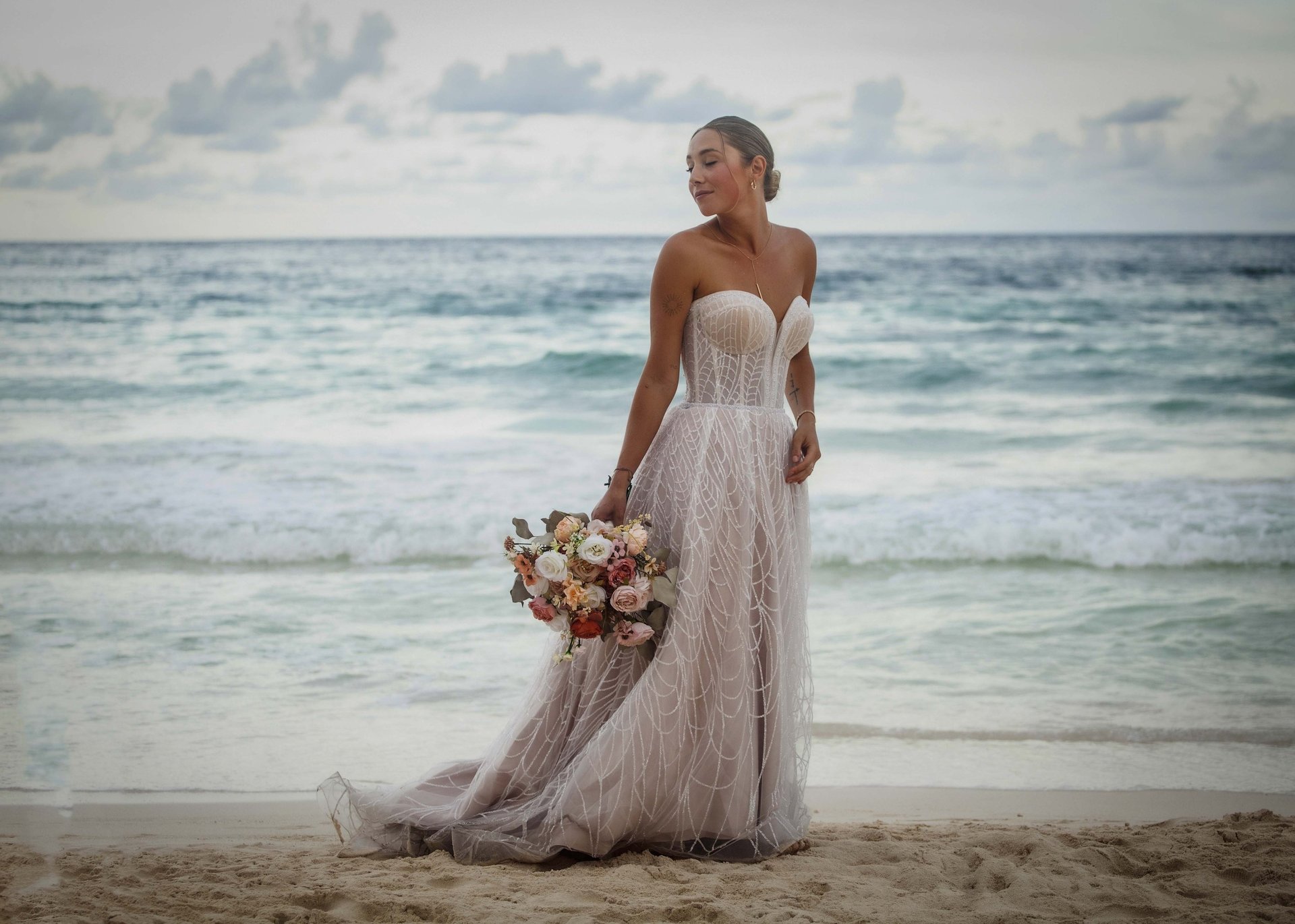 an abstract photo of a curved building with a blue sky in the background