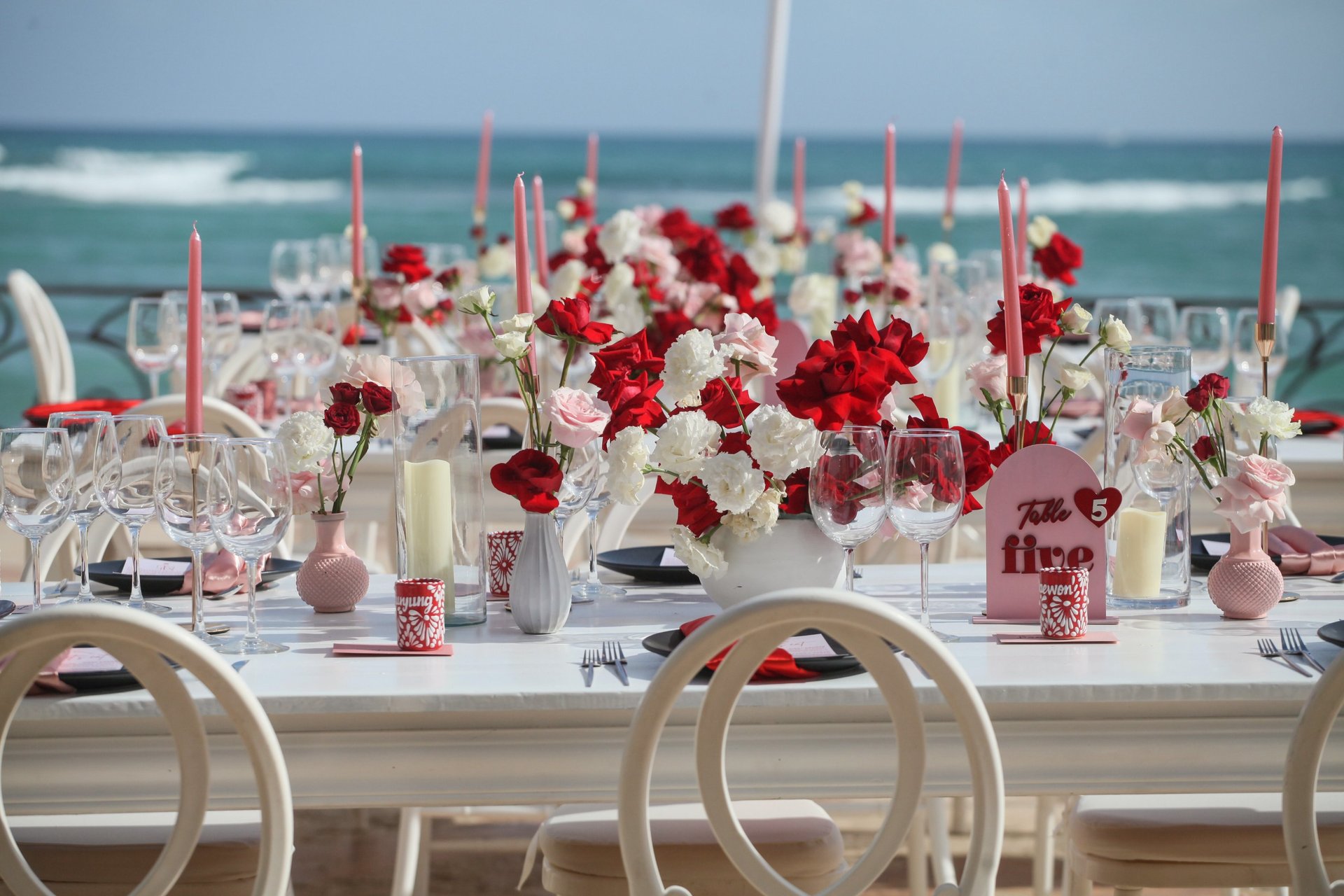 an abstract photo of a curved building with a blue sky in the background