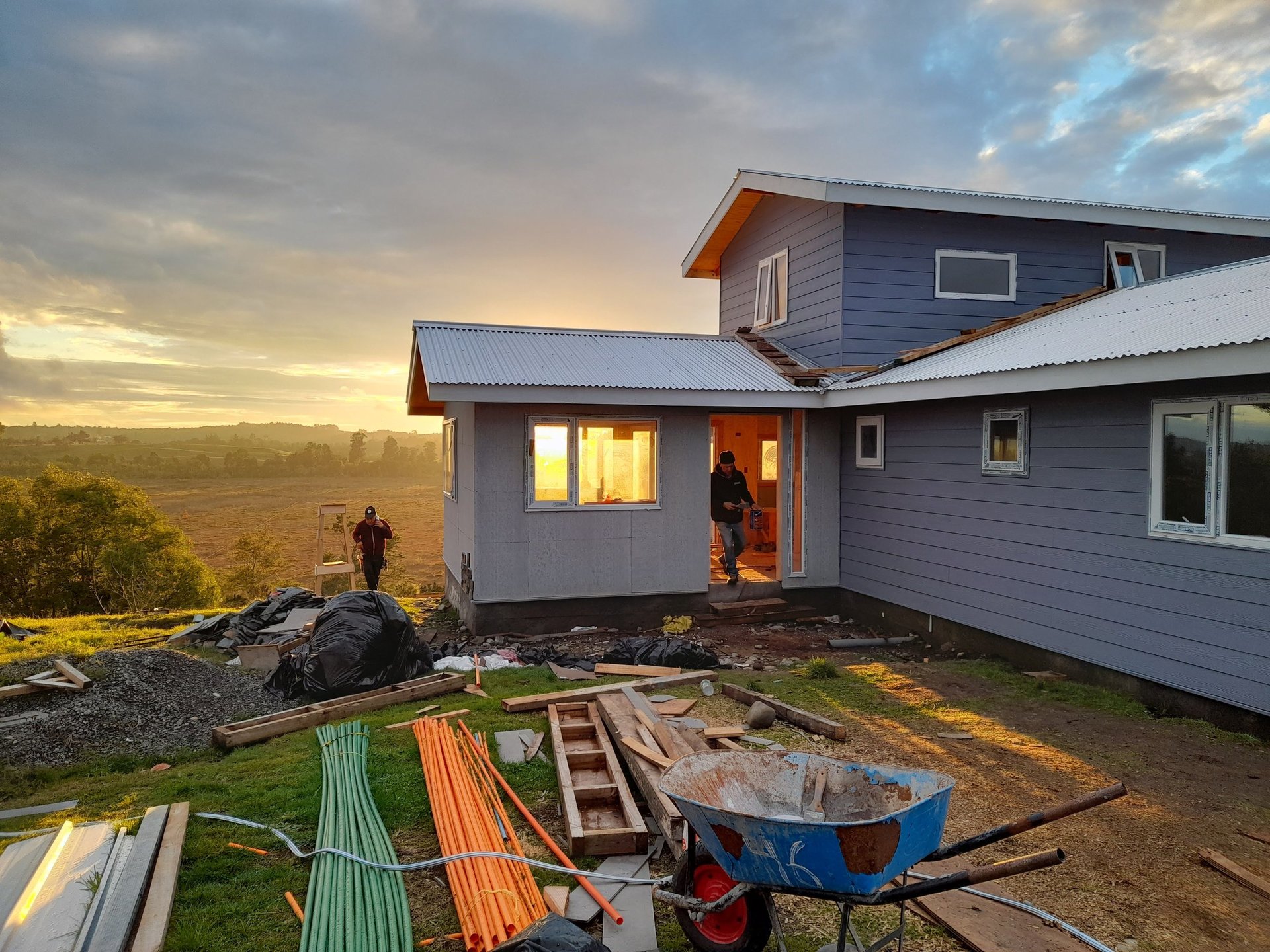 woman wearing yellow long-sleeved dress under white clouds and blue sky during daytime