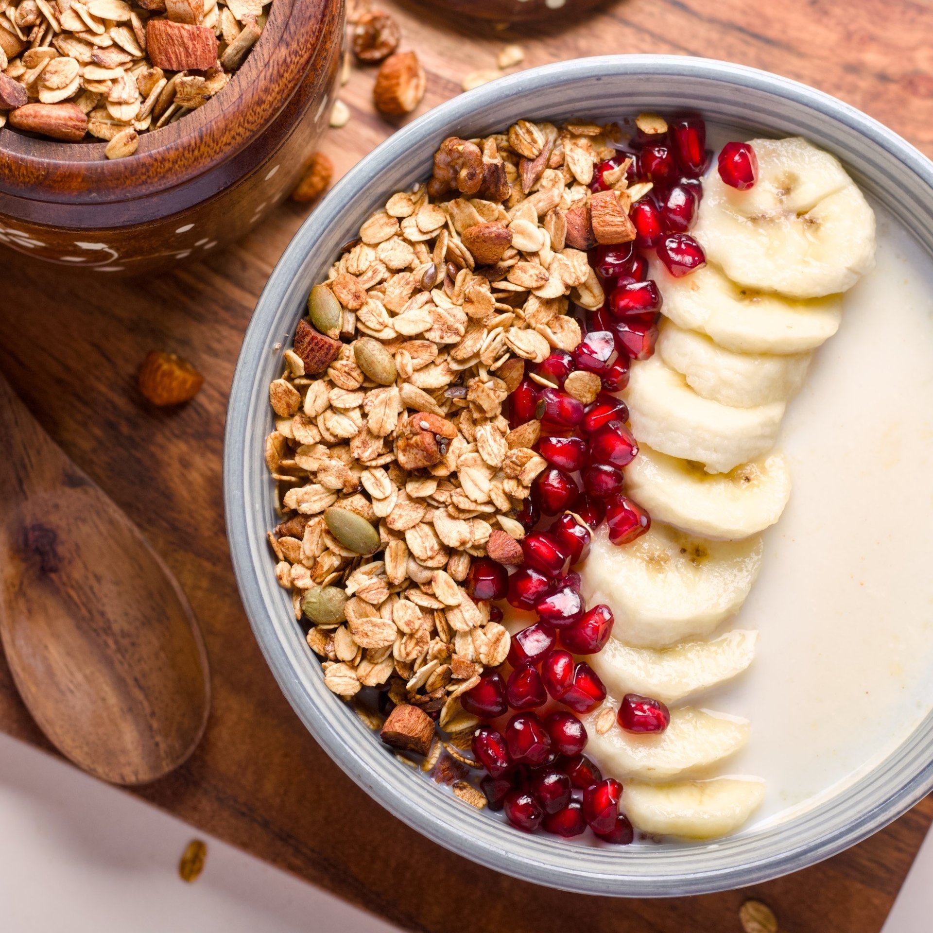 an abstract photo of a curved building with a blue sky in the background