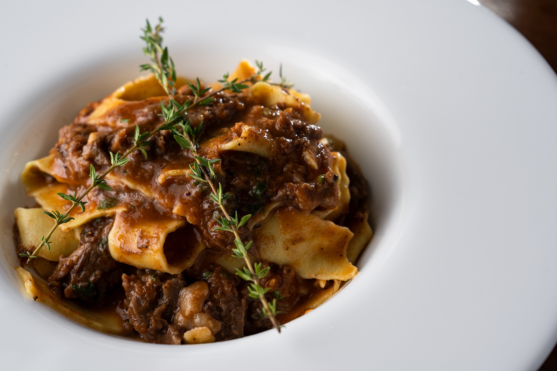 black and brown leather padded tub sofa