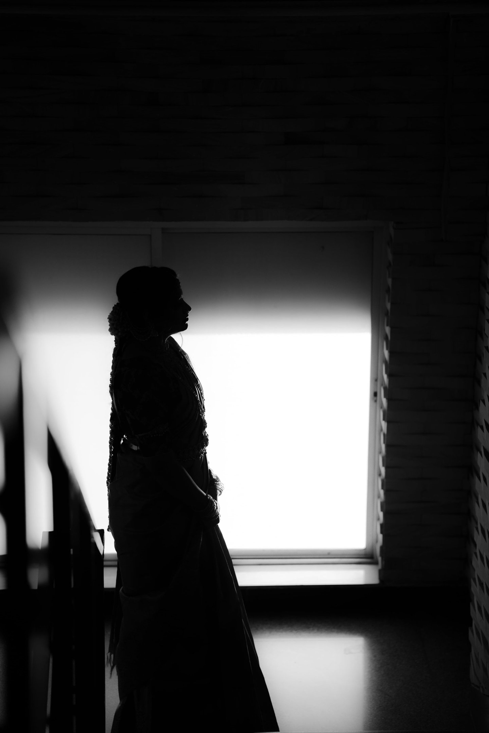 person holding hands wearing gold-colored ring