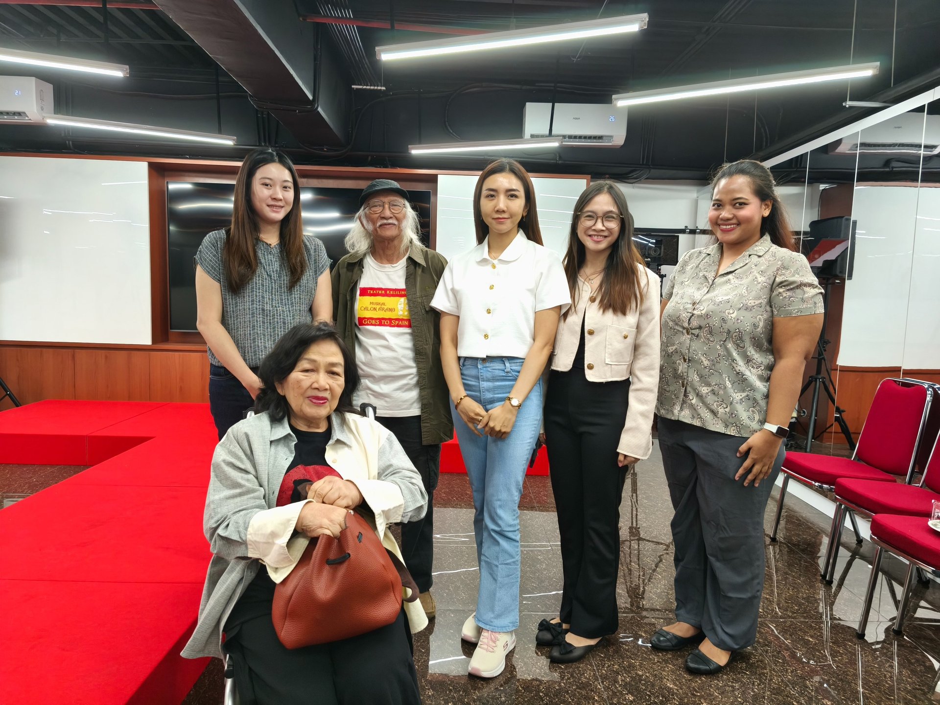 black and brown leather padded tub sofa