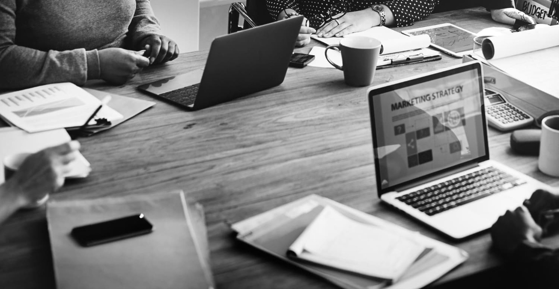 an abstract photo of a curved building with a blue sky in the background