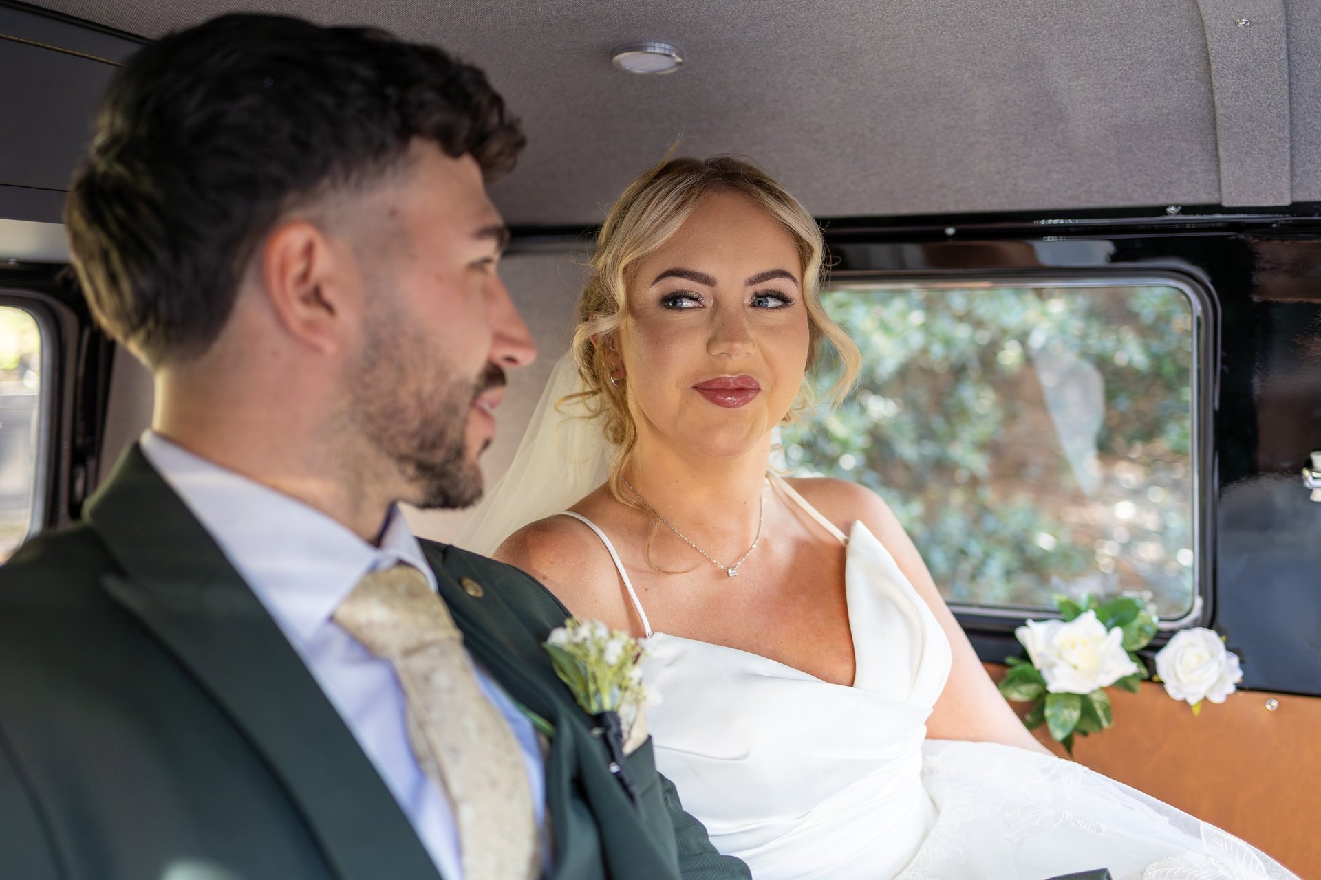 an abstract photo of a curved building with a blue sky in the background