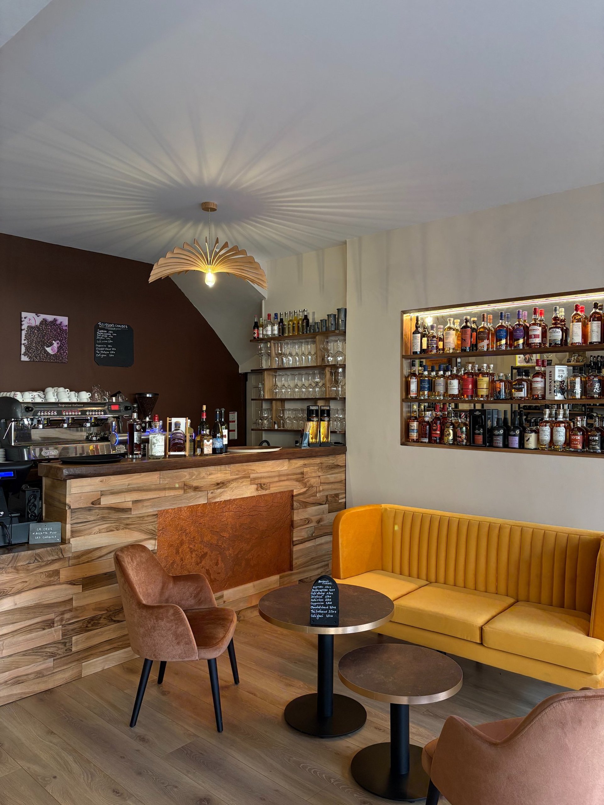 two person sitting on bar stool chair in front of bar front desk